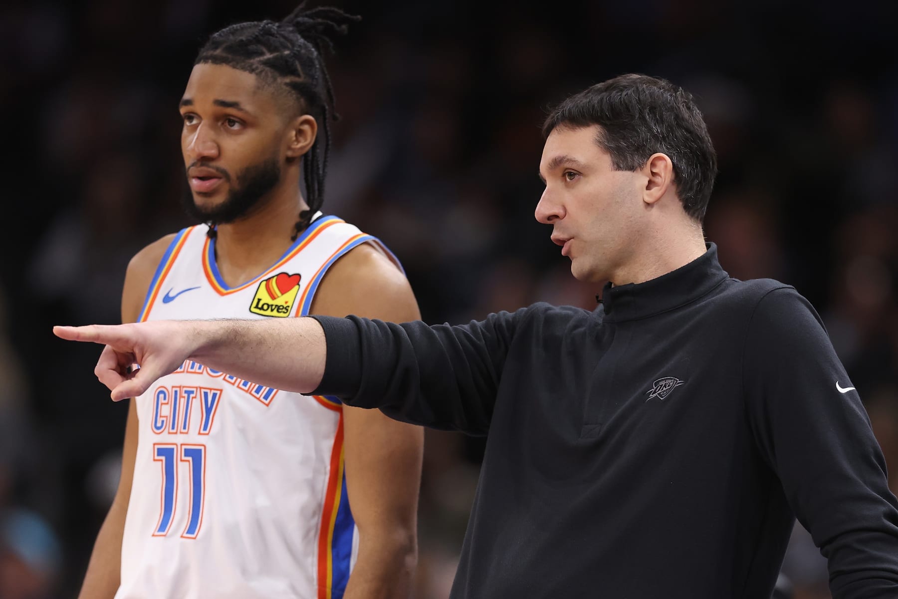 PHOENIX, ARIZONA - MARCH 03: Head coach Mark Daigneault of the Oklahoma City Thunder talks with Isaiah Joe #11 during the first half of the NBA game at Footprint Center on March 03, 2024 in Phoenix, Arizona. NOTE TO USER: User expressly acknowledges and agrees that, by downloading and or using this photograph, User is consenting to the terms and conditions of the Getty Images License Agreement. (Photo by Christian Petersen/Getty Images)