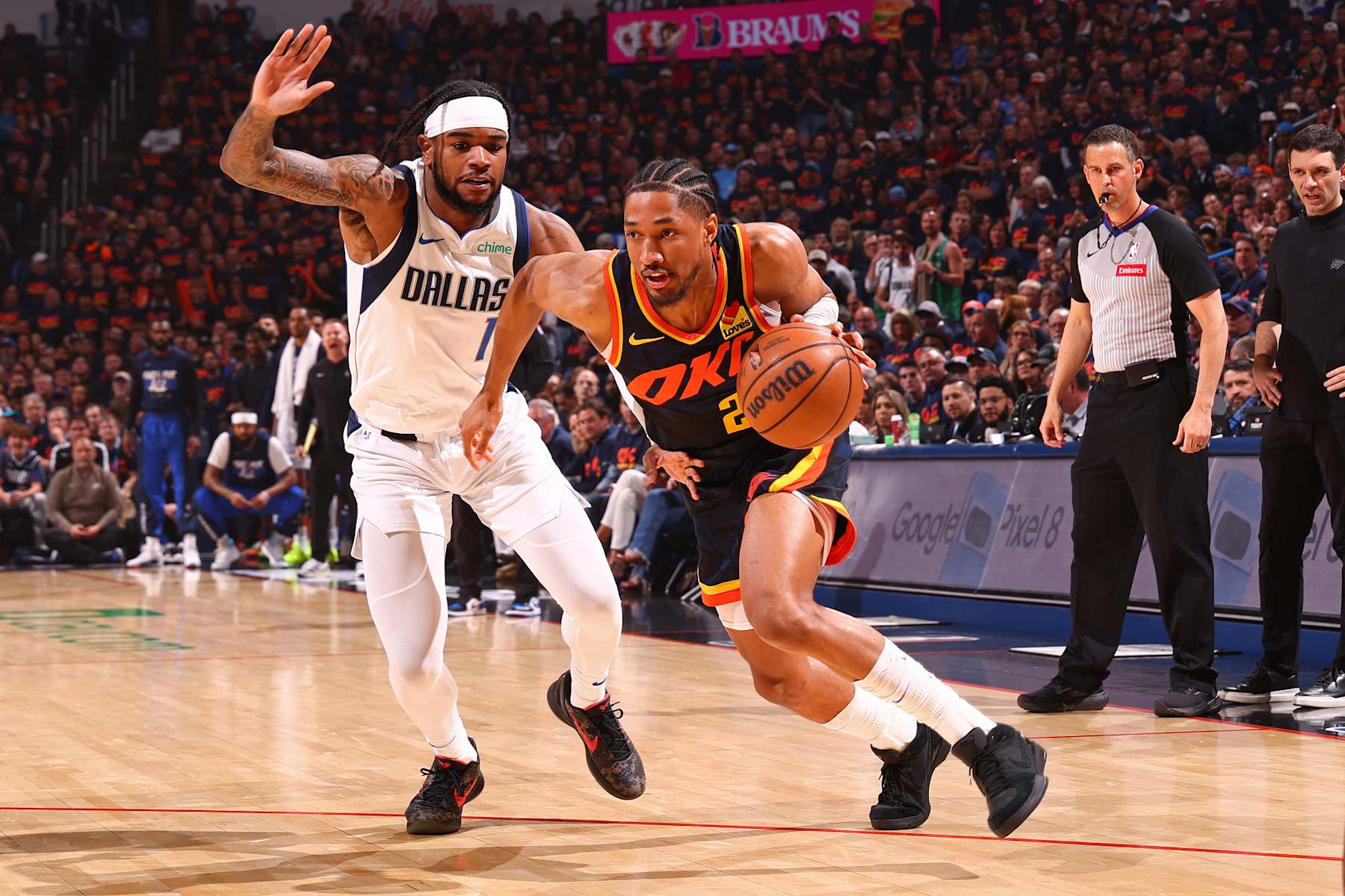 OKLAHOMA CITY, OK - MAY 15: Aaron Wiggins #21 of the Oklahoma City Thunder handles the ball during the game against the Dallas Mavericks during Round 2 Game 5 of the 2024 NBA Playoffs on May 15, 2024 at Paycom Arena in Oklahoma City, Oklahoma. NOTE TO USER: User expressly acknowledges and agrees that, by downloading and or using this photograph, User is consenting to the terms and conditions of the Getty Images License Agreement. Mandatory Copyright Notice: Copyright 2024 NBAE (Photo by Zach Beeker/NBAE via Getty Images)