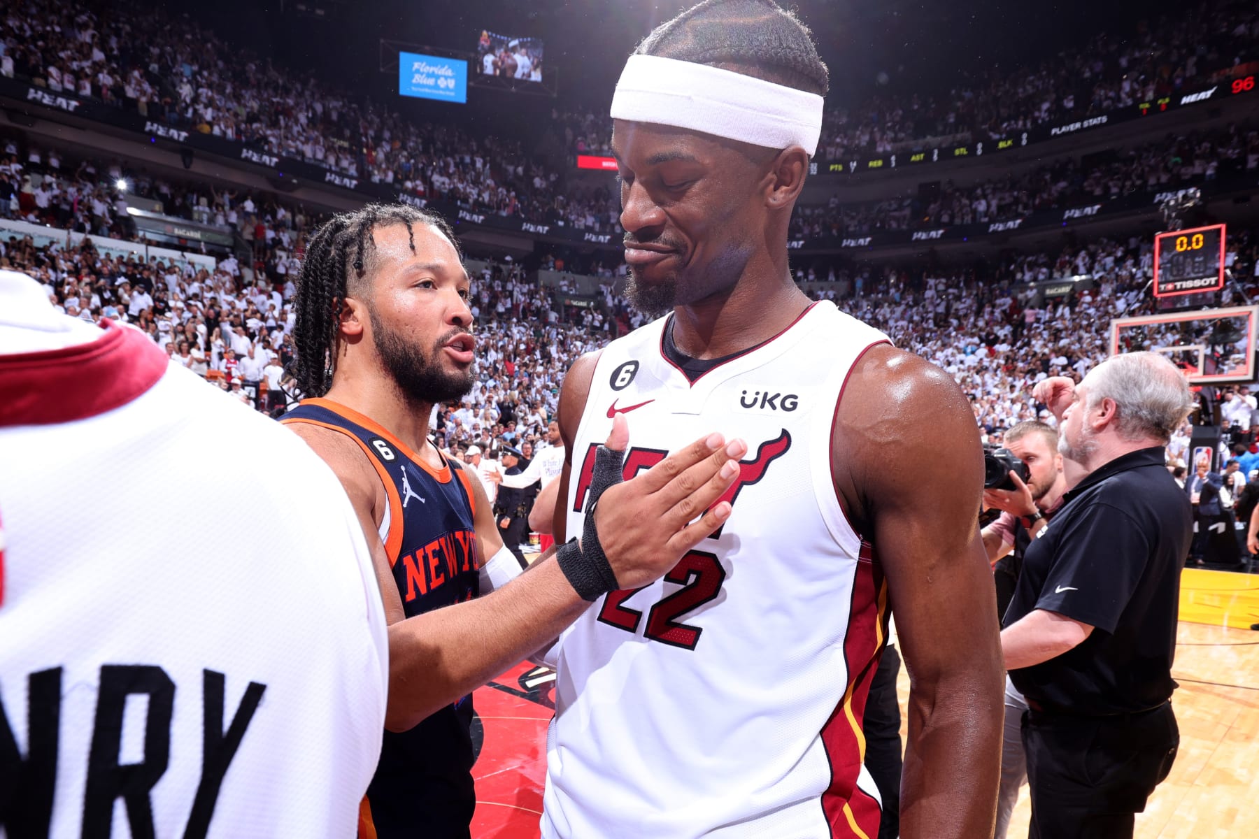 MIAMI, FL - MAY 12: Jimmy Butler #22 of the Miami Heat talks with Jalen Brunson #11 of the New York Knicks after Game 6 of the 2023 NBA Playoffs Eastern Conference semi-finals on May 12, 2023 at Kaseya Center in Miami, Florida. NOTE TO USER: User expressly acknowledges and agrees that, by downloading and or using this Photograph, user is consenting to the terms and conditions of the Getty Images License Agreement. Mandatory Copyright Notice: Copyright 2023 NBAE (Photo by Nathaniel S. Butler/NBAE via Getty Images)