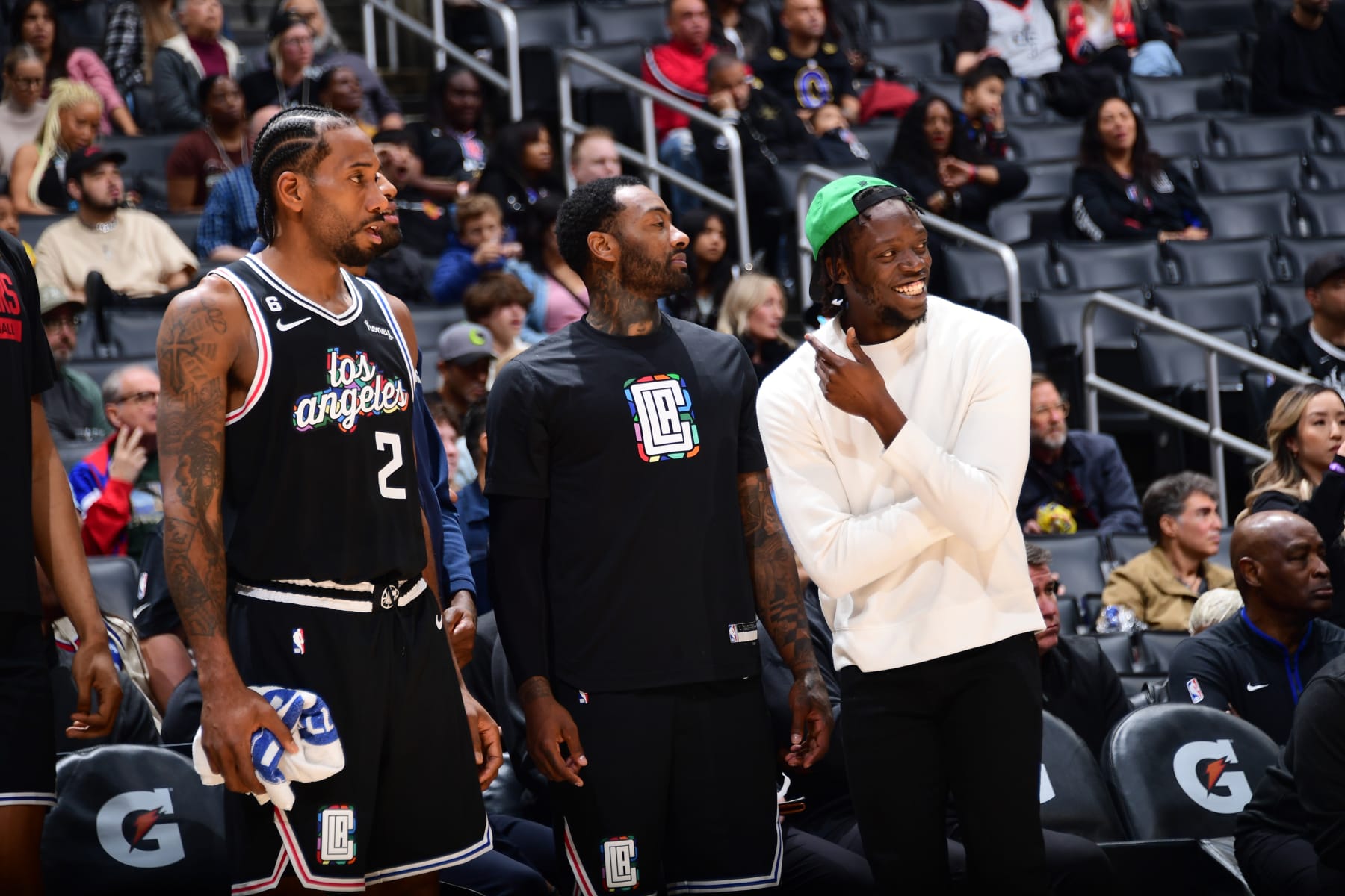 LOS ANGELES, CA - DECEMBER 17: Kawhi Leonard #2, John Wall #11, and Reggie Jackson #1 of the LA Clippers look on during the game against the Washington Wizards on December 17, 2022 at Crypto.Com Arena in Los Angeles, California. NOTE TO USER: User expressly acknowledges and agrees that, by downloading and/or using this Photograph, user is consenting to the terms and conditions of the Getty Images License Agreement. Mandatory Copyright Notice: Copyright 2022 NBAE (Photo by Adam Pantozzi/NBAE via Getty Images)