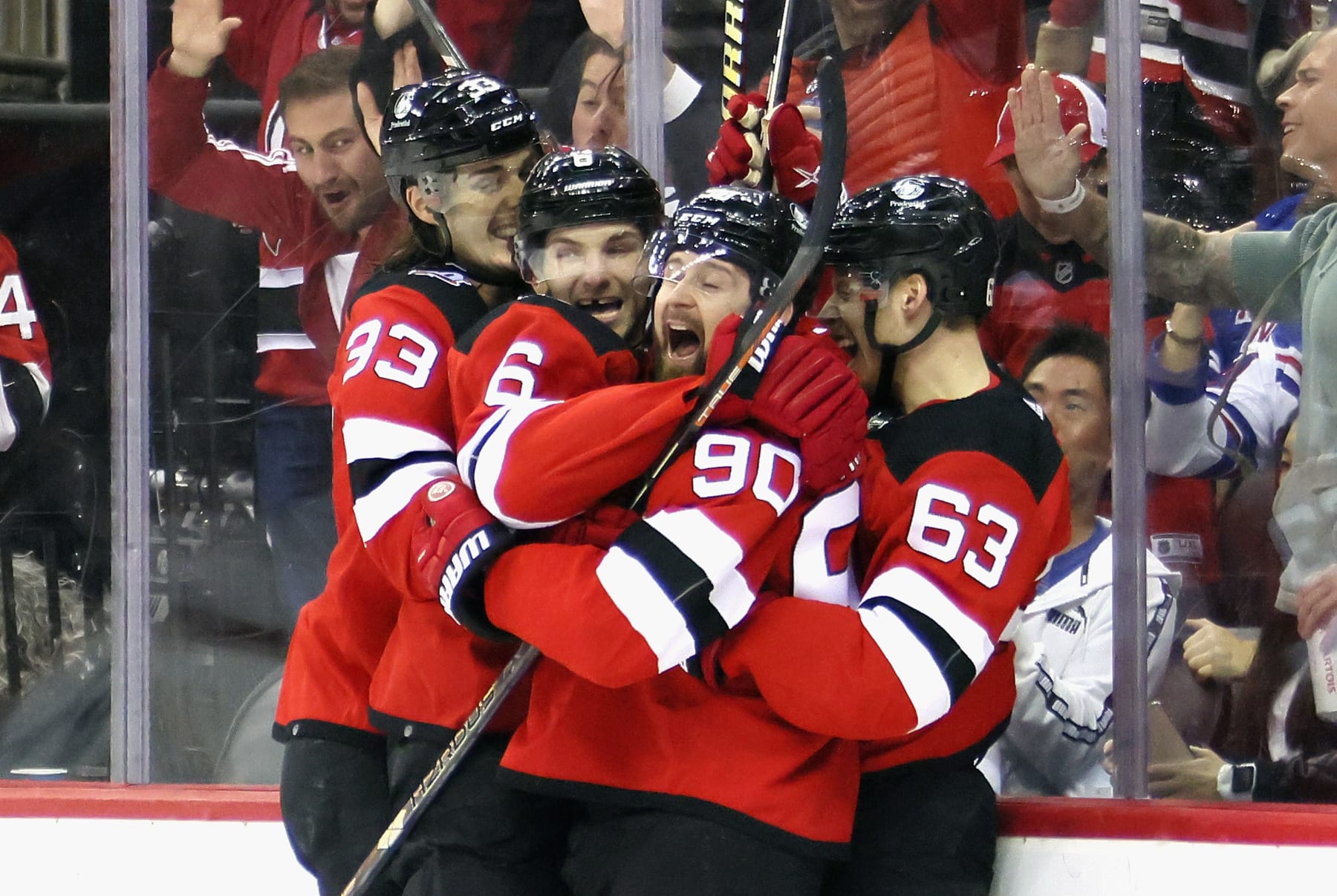 NEWARK, NEW JERSEY - MAY 01: Tomas Tatar #90 of the New Jersey Devils (2nd from right) celebrates his second period goal against the New York Rangers in Game Seven of the First Round of the 2023 Stanley Cup Playoffs at Prudential Center on May 01, 2023 in Newark, New Jersey. (Photo by Bruce Bennett/Getty Images)