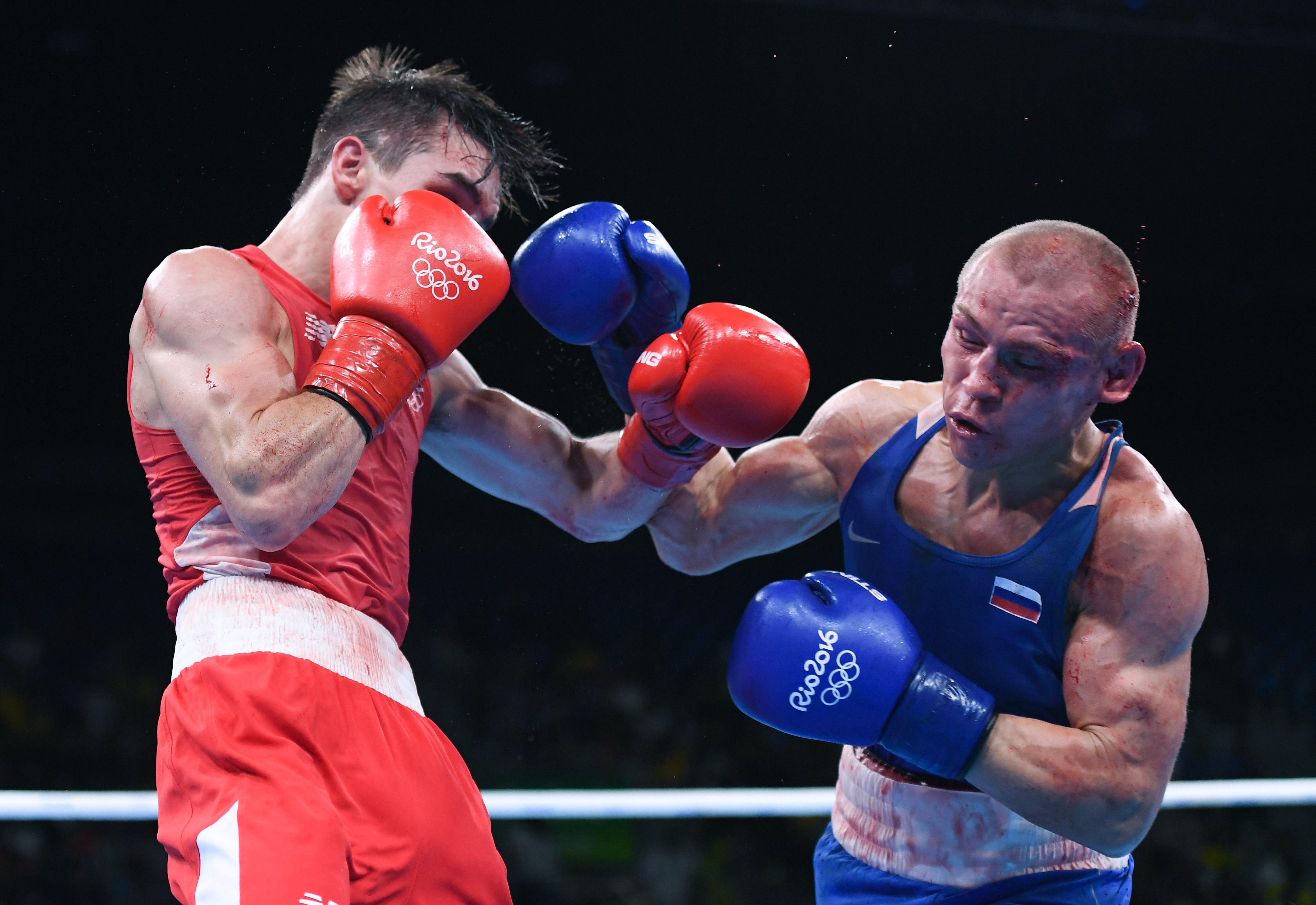 Rio , Brazil - 16 August 2016; Vladimir Nikitin of Russia, right, exchanges punches with Michael Conlan of Ireland during their Bantamweight Quarterfinal bout at the Riocentro Pavillion 6 Arena during the 2016 Rio Summer Olympic Games in Rio de Janeiro, Brazil. (Photo By Stephen McCarthy/Sportsfile via Getty Images)