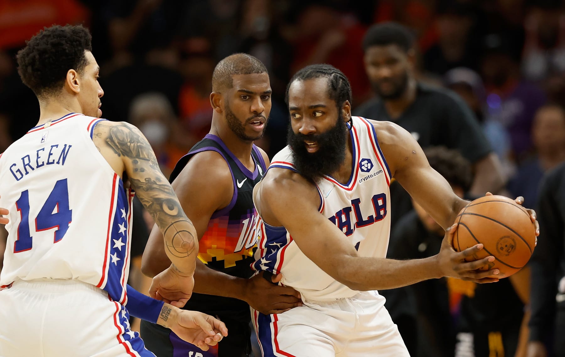 PHOENIX, ARIZONA - MARCH 27: James Harden #1 of the Philadelphia 76ers handles the ball against Chris Paul #3 of the Phoenix Suns during the second half of the NBA game at Footprint Center on March 27, 2022 in Phoenix, Arizona. The Suns defeated the 76ers 114-104.  NOTE TO USER: User expressly acknowledges and agrees that, by downloading and or using this photograph, User is consenting to the terms and conditions of the Getty Images License Agreement. (Photo by Christian Petersen/Getty Images)