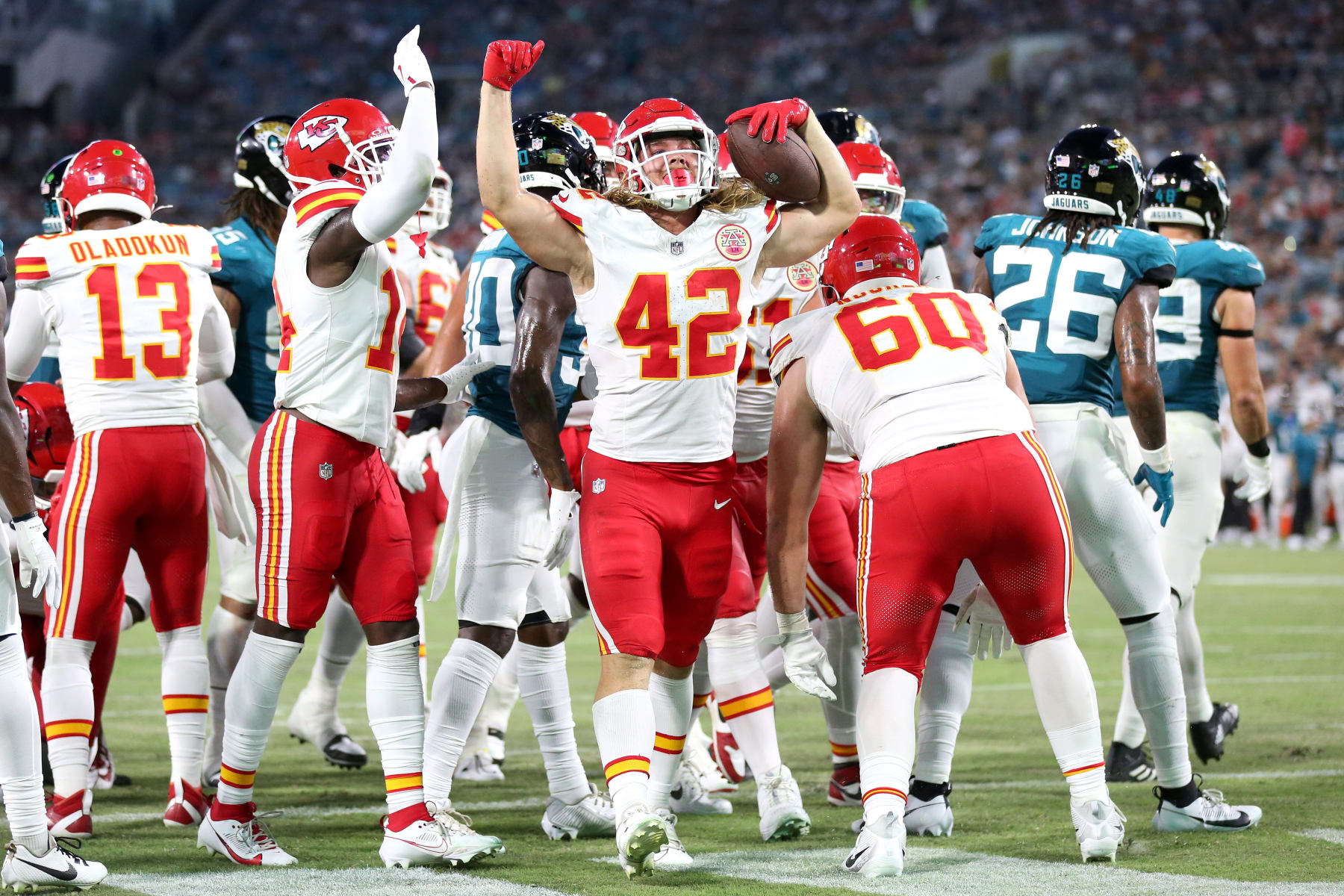 JACKSONVILLE, FLORIDA - AUGUST 10: Carson Steele #42 of the Kansas City Chiefs scores a touchdown during the first half against the Jacksonville Jaguars during a preseason game at EverBank Stadium on August 10, 2024 in Jacksonville, Florida. (Photo by Courtney Culbreath/Getty Images)