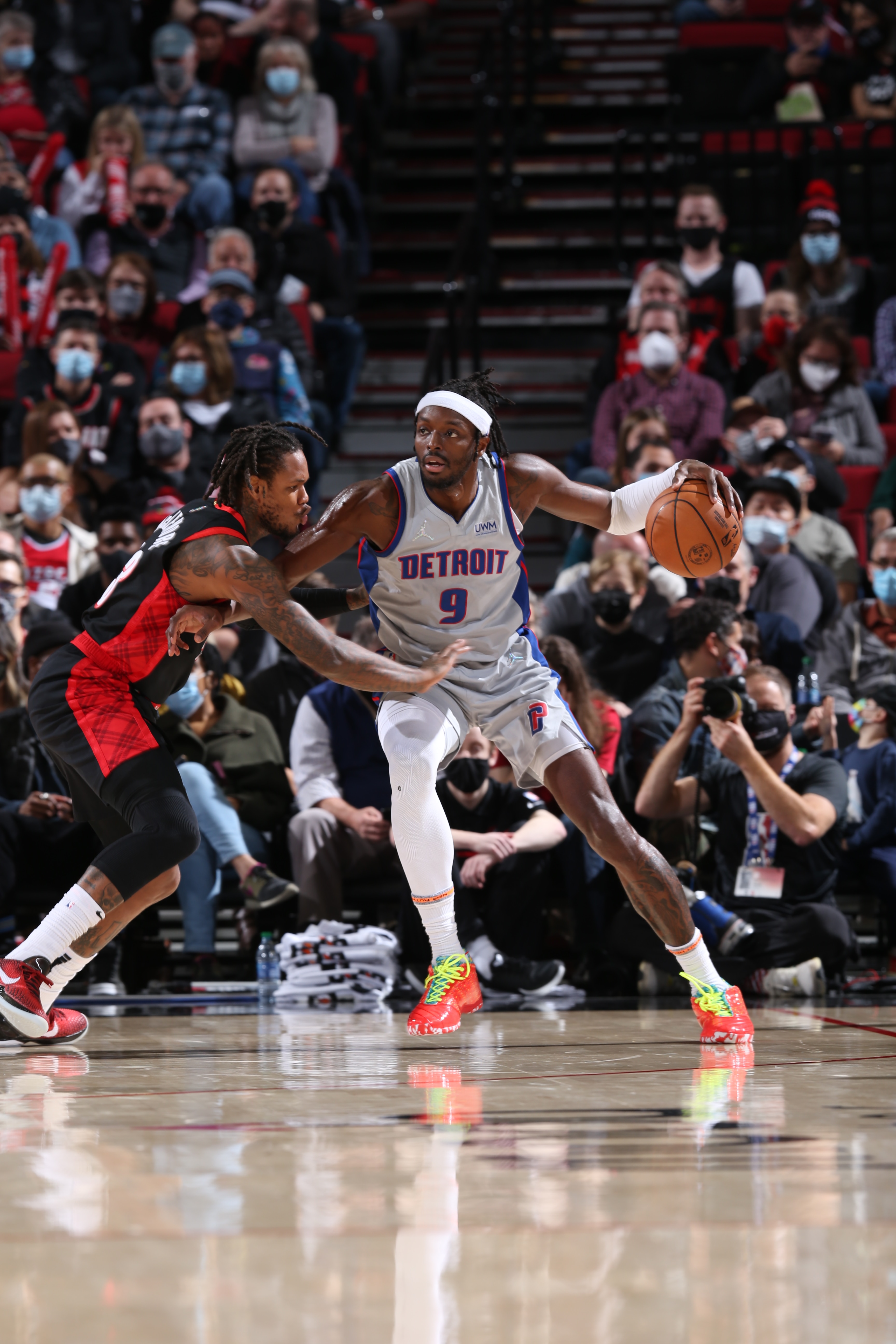 PORTLAND, OR - NOVEMBER 30: Jerami Grant #9 of the Detroit Pistons handles the ball against the Portland Trail Blazers on November 30, 2021at the Moda Center Arena in Portland, Oregon. NOTE TO USER: User expressly acknowledges and agrees that, by downloading and or using this photograph, user is consenting to the terms and conditions of the Getty Images License Agreement. Mandatory Copyright Notice: Copyright 2021 NBAE (Photo by Sam Forencich/NBAE via Getty Images)