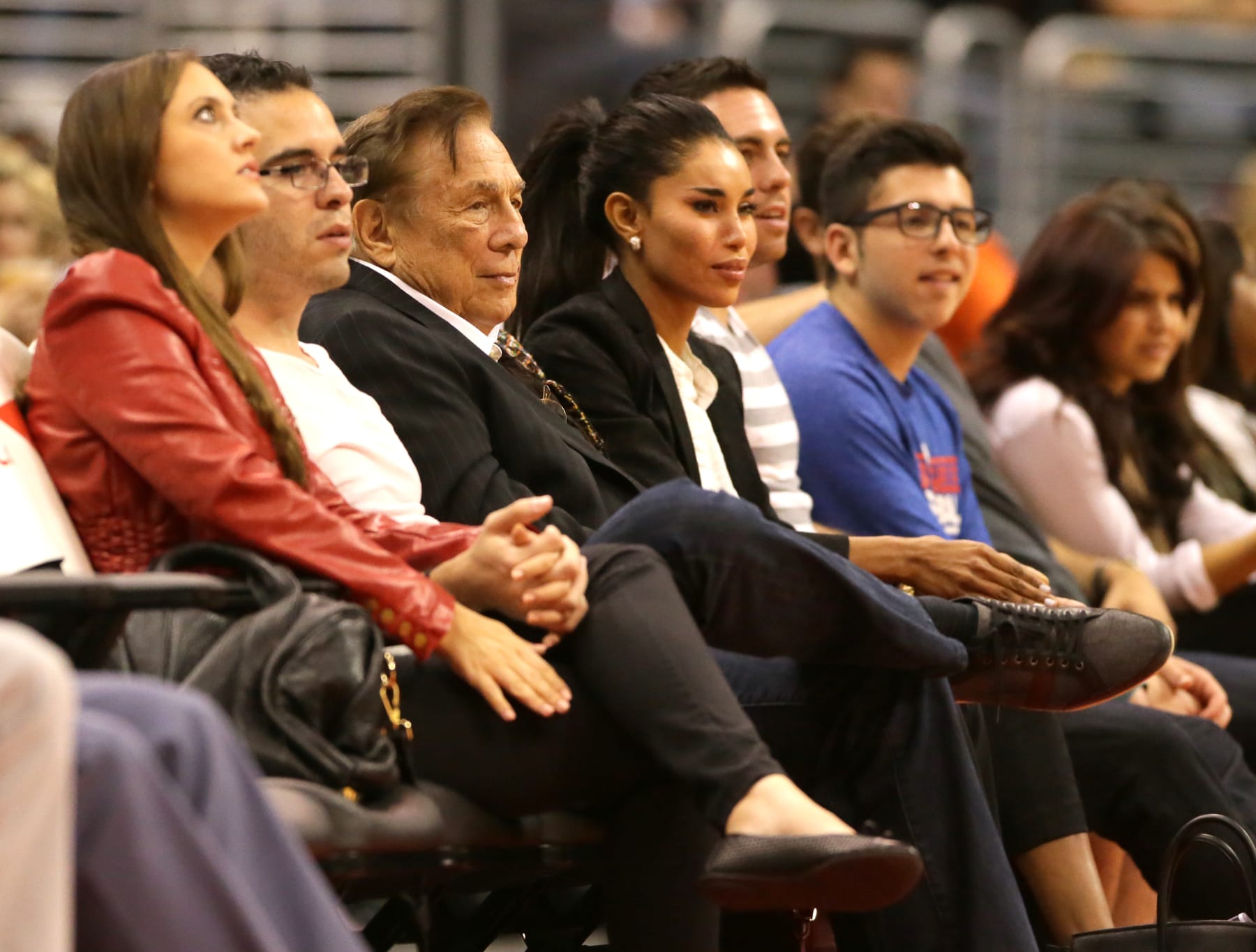 Clippers owner Donald Sterling seated courtside with V. Stiviano during a game against the Utah Jazz at Staples Center.  (Photo by Robert Gauthier/Los Angeles Times via Getty Images)