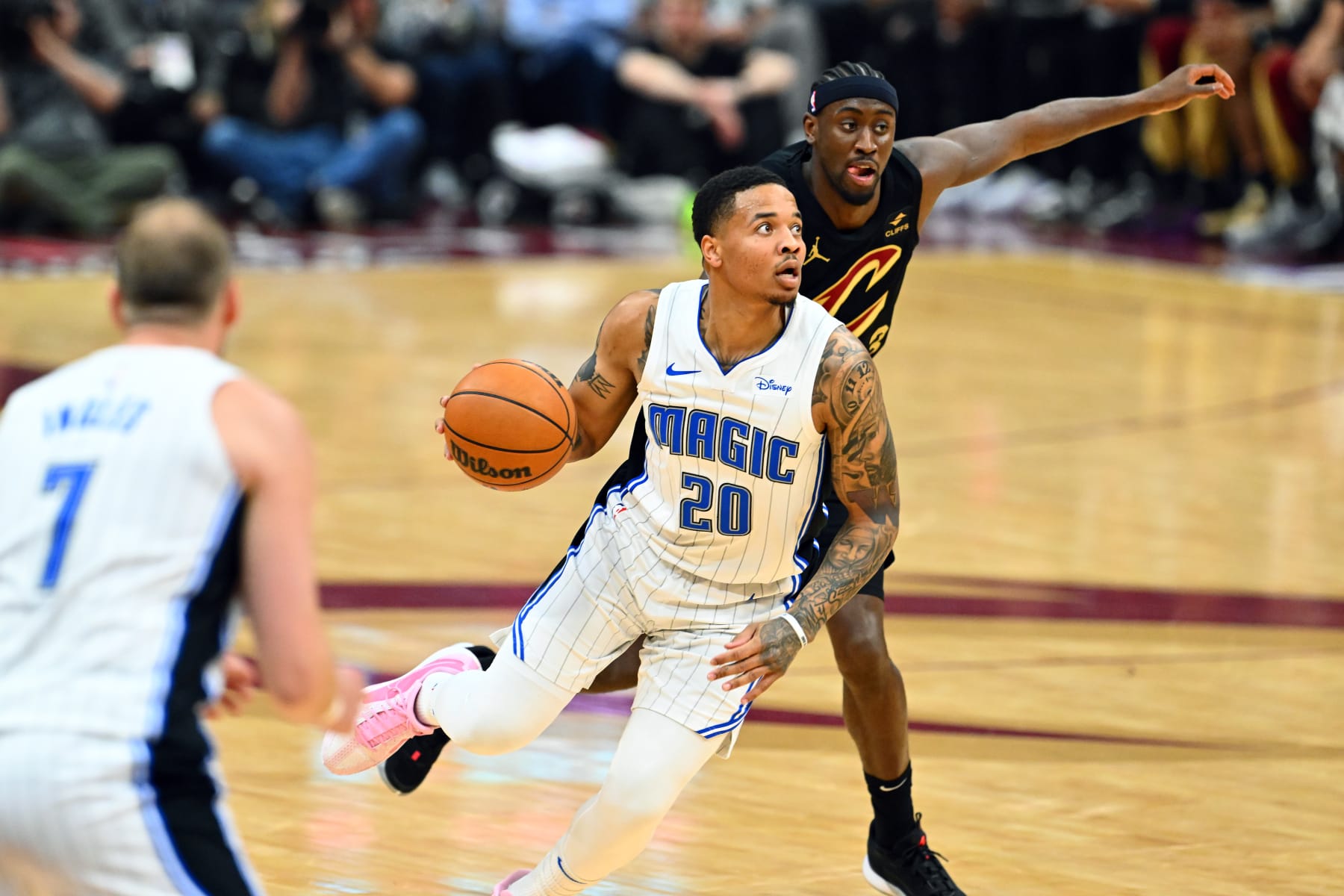 CLEVELAND, OHIO - APRIL 30: Markelle Fultz #20 of the Orlando Magic drives to the basket around Caris LeVert #3 of the Cleveland Cavaliers during the second quarter of game five of the Eastern Conference First Round Playoffs at Rocket Mortgage Fieldhouse on April 30, 2024 in Cleveland, Ohio. NOTE TO USER: User expressly acknowledges and agrees that, by downloading and or using this photograph, User is consenting to the terms and conditions of the Getty Images License Agreement. (Photo by Jason Miller/Getty Images)