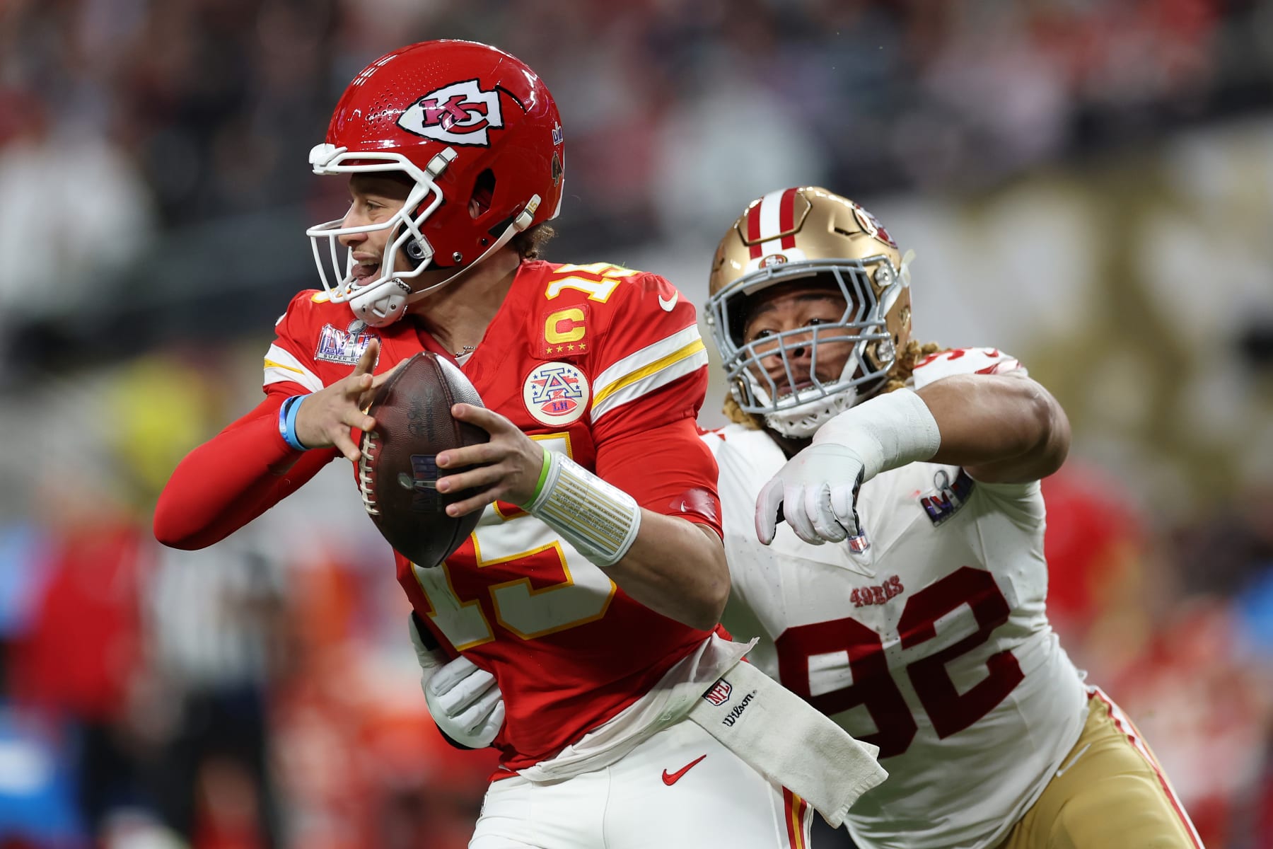 LAS VEGAS, NEVADA - FEBRUARY 11: Patrick Mahomes #15 of the Kansas City Chiefs is tackled by Chase Young #92 of the San Francisco 49ers in the second quarter during Super Bowl LVIII at Allegiant Stadium on February 11, 2024 in Las Vegas, Nevada. (Photo by Ezra Shaw/Getty Images)