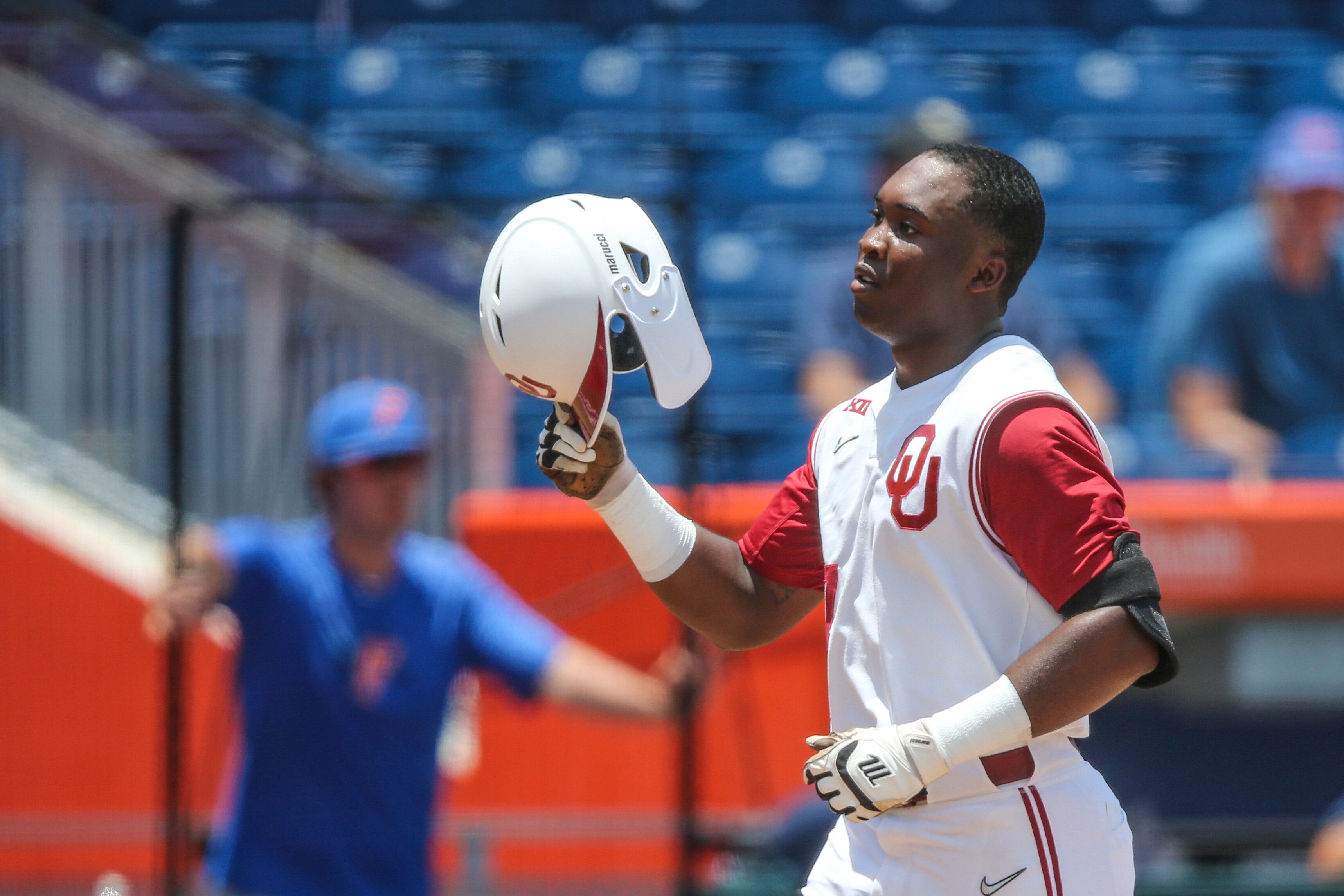 Oklahoma outfielder Kendall Pettis (7) after crossing home plate, after hitting a two-RBI homerun during an NCAA regionals championship baseball game against Liberty on Friday, June 3, 2022 in Gainesville, Fla. (AP Photo/Gary McCullough)