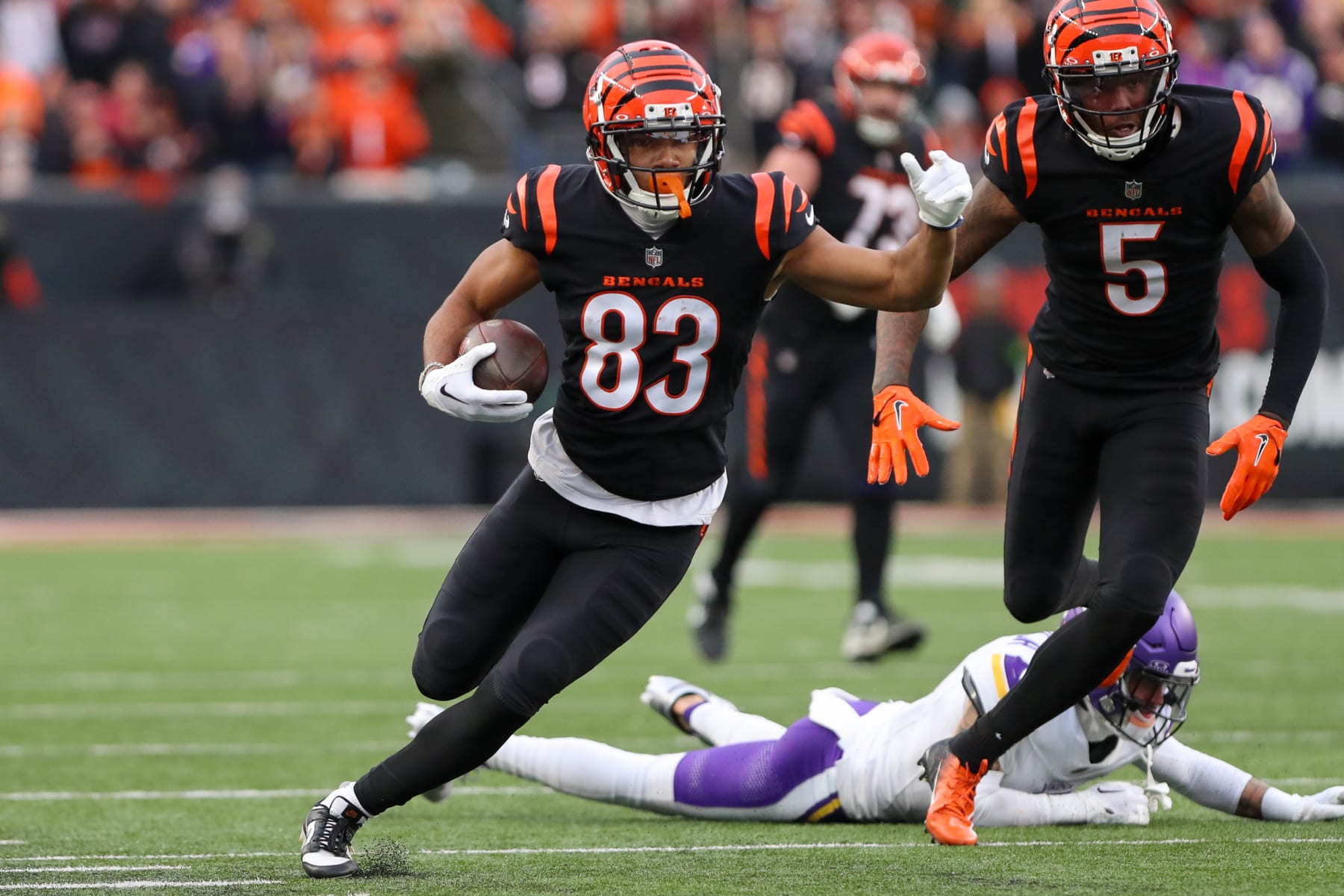 CINCINNATI, OH - DECEMBER 16: Cincinnati Bengals wide receiver Tyler Boyd (83) carries the ball during the game against the Minnesota Vikings and the Cincinnati Bengals on December 16, 2023, at Paycor Stadium in Cincinnati, OH. (Photo by Ian Johnson/Icon Sportswire via Getty Images)