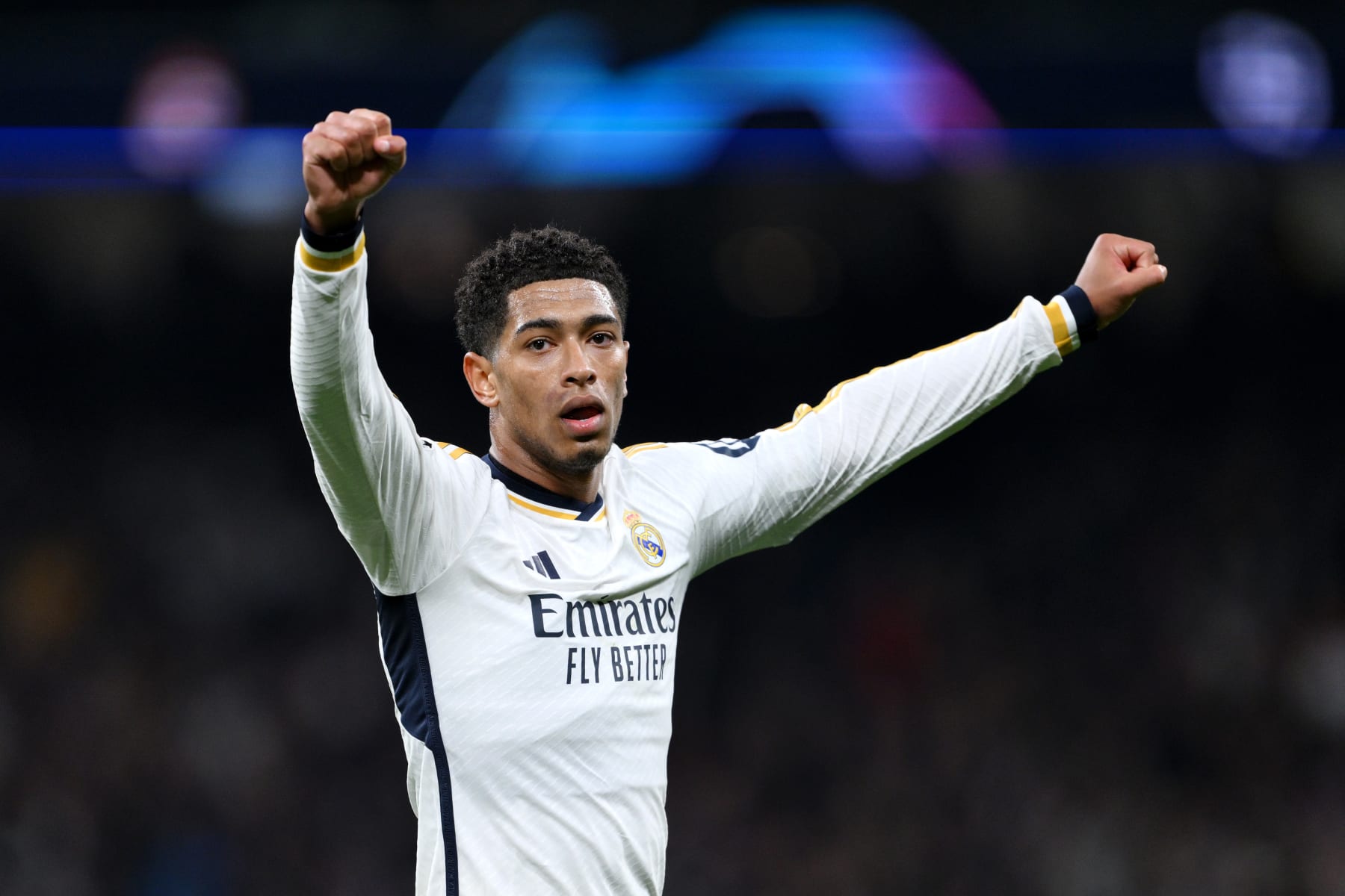 MADRID, SPAIN - MARCH 06: Jude Bellingham of Real Madrid celebrates after Vinicius Junior of Real Madrid (not pictured) scores his team's first goal during the UEFA Champions League 2023/24 round of 16 second leg match between Real Madrid CF and RB Leipzig at Estadio Santiago Bernabeu on March 06, 2024 in Madrid, Spain. (Photo by David Ramos/Getty Images)