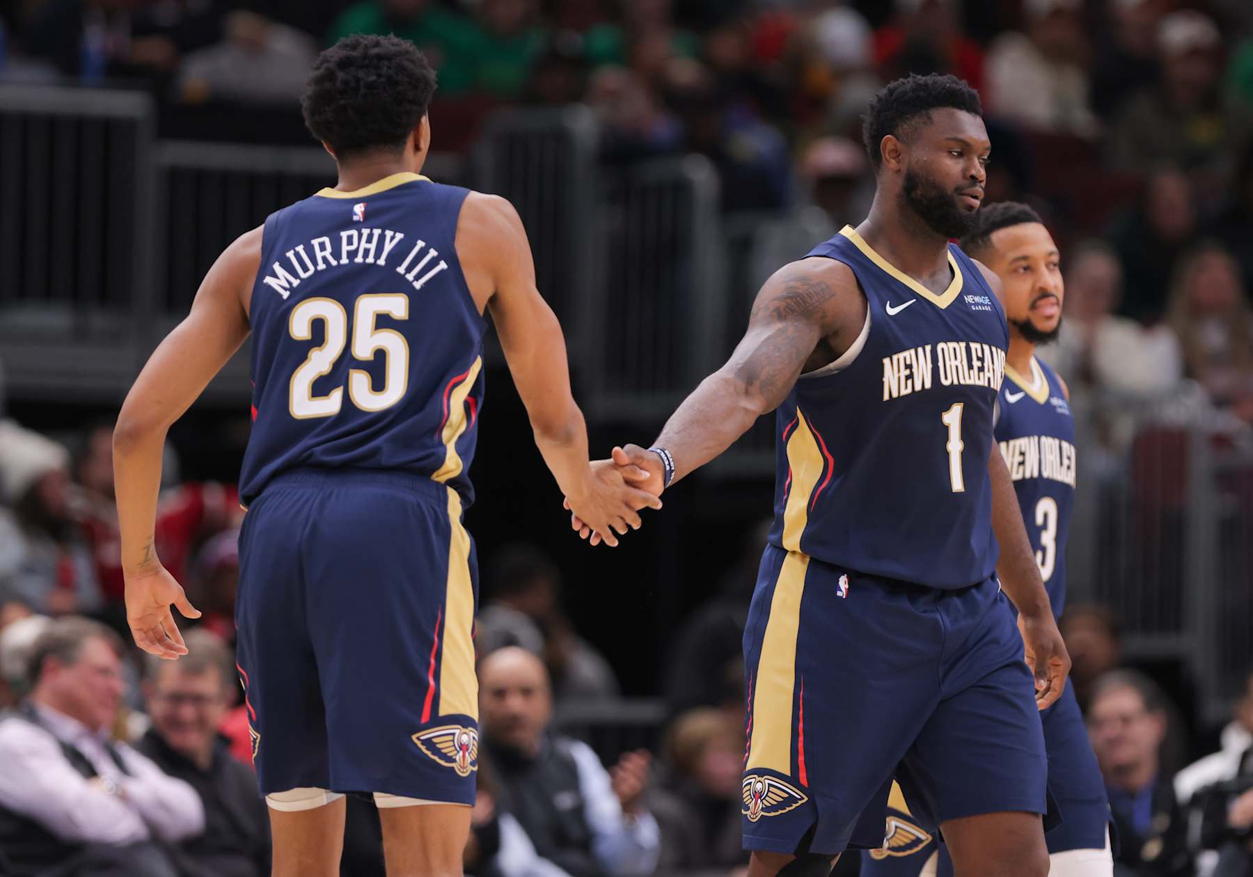 CHICAGO, IL - JANUARY 14: Trey Murphy III #25 of the New Orleans Pelicans and Zion Williamson #1 of the New Orleans Pelicans react after a play during the second half against the Chicago Bulls on January 14, 2025 at the United Center in Chicago, Illinois. (Photo by Melissa Tamez/Icon Sportswire via Getty Images)