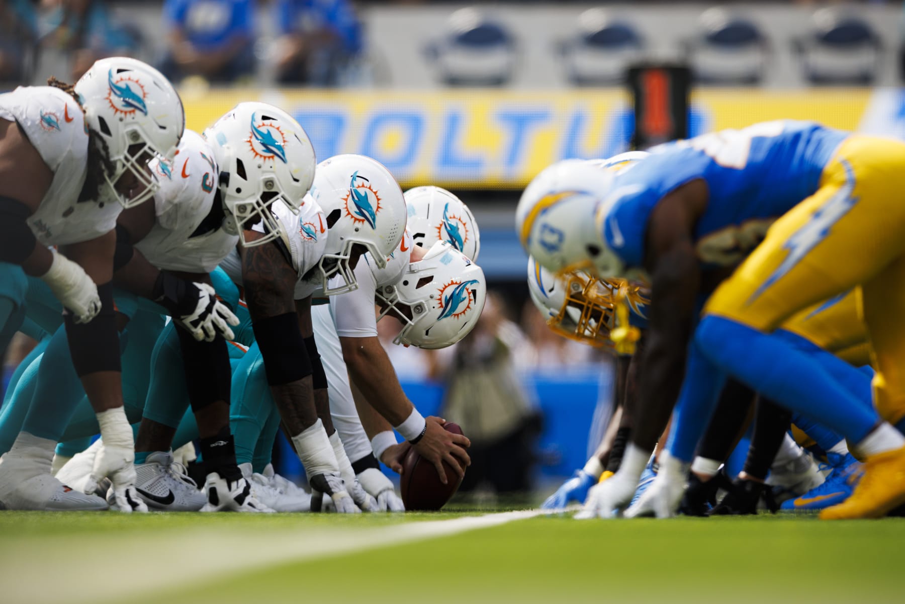 INGLEWOOD, CALIFORNIA - SEPTEMBER 10: Miami Dolphins offense and Los Angeles Chargers defense at the line of scrimmage before an extra point attempt during a game at SoFi Stadium on September 10, 2023 in Inglewood, California. (Photo by Ric Tapia/Getty Images)