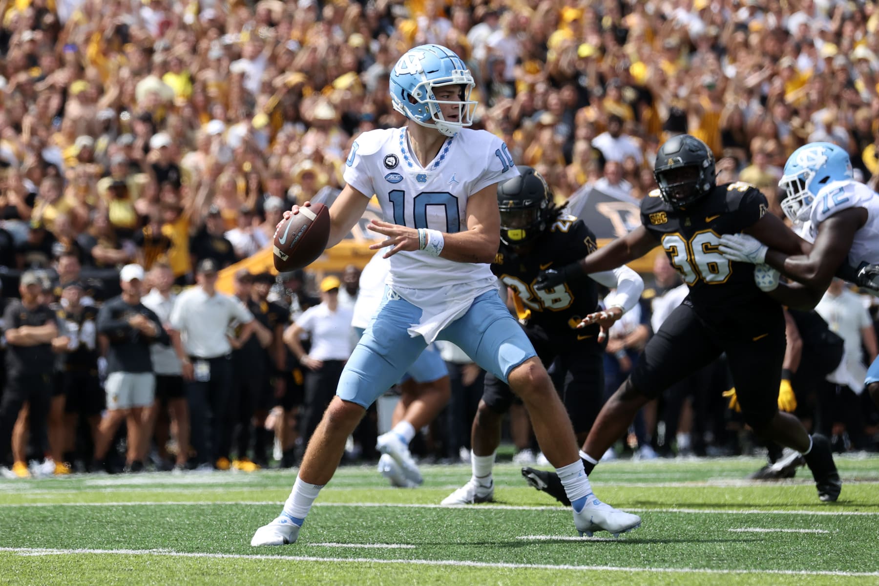 BOONE, NC - SEPTEMBER 3: Drake Maye #10 of the University of North Carolina drops back to pass during a game between North Carolina and Appalachian State at Kidd Brewer Stadium on September 3, 2022 in Boone, North Carolina. (Photo by Andy Mead/ISI Photos/Getty Images)