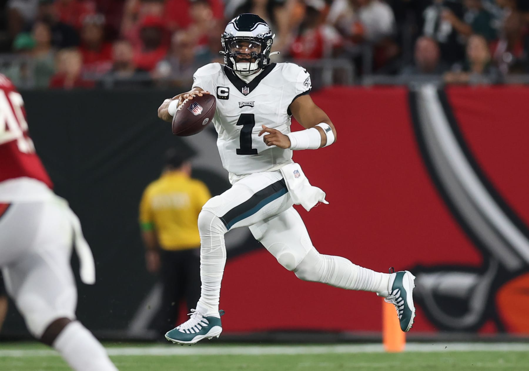 TAMPA, FLORIDA - SEPTEMBER 25: Jalen Hurts #1 of the Philadelphia Eagles looks to pass during the first quarter against the Tampa Bay Buccaneers at Raymond James Stadium on September 25, 2023 in Tampa, Florida. (Photo by Mike Carlson/Getty Images)