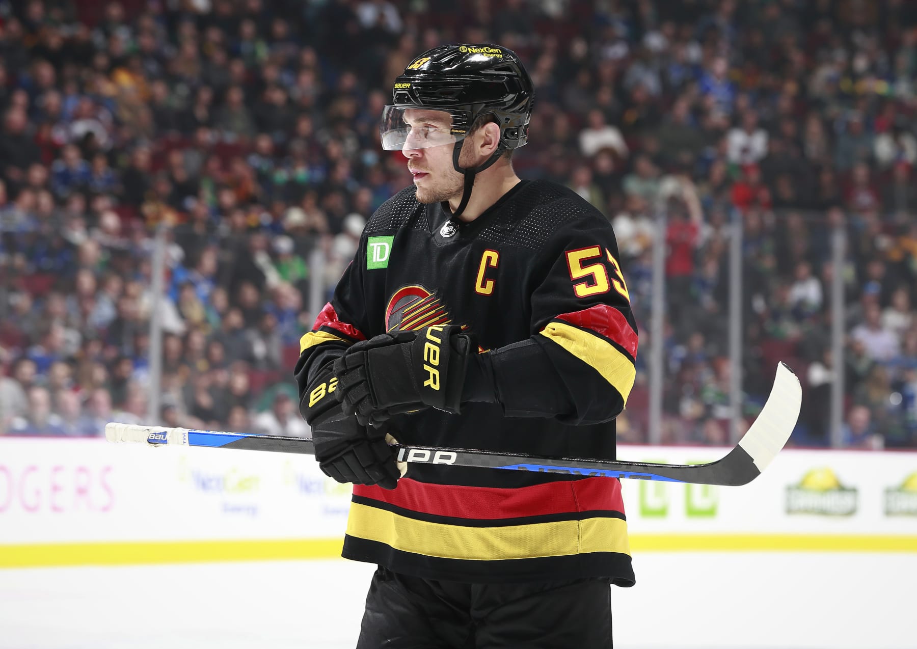 VANCOUVER, CANADA - JANUARY 20: Bo Horvat #53 of the Vancouver Canucks lines up for a face-off during their NHL game against the Colorado Avalanche at Rogers Arena January 20, 2023 in Vancouver, British Columbia, Canada.  (Photo by Jeff Vinnick/NHLI via Getty Images)