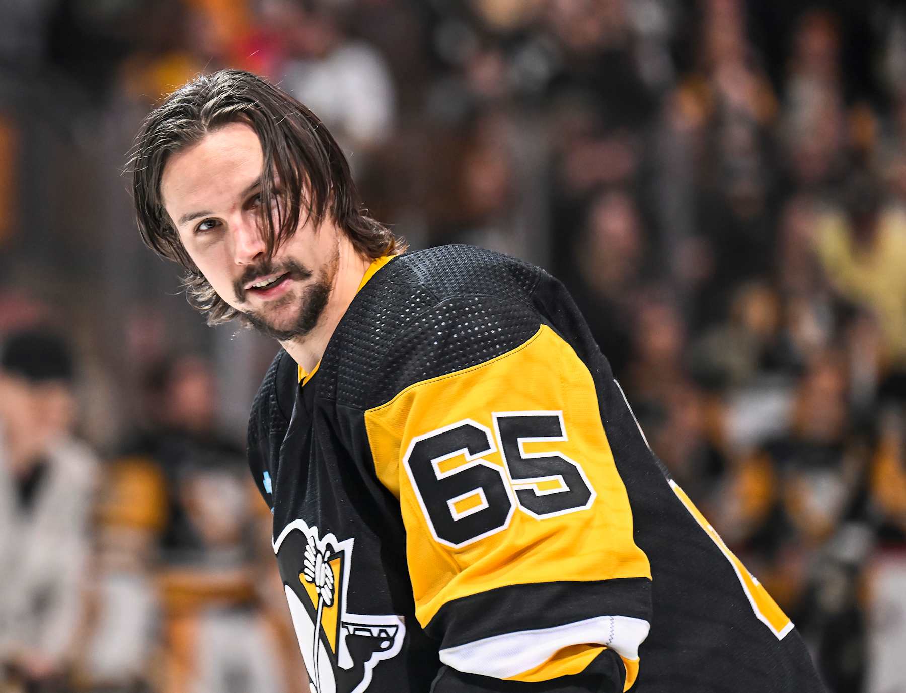 PITTSBURGH, PA - APRIL 13: Pittsburgh Penguins defenseman Erik Karlsson (65) looks on during the first period in the NHL game between the Pittsburgh Penguins and the Boston Bruins on April 13, 2024, at PPG Paints Arena in Pittsburgh, PA. (Photo by Jeanine Leech/Icon Sportswire via Getty Images)
