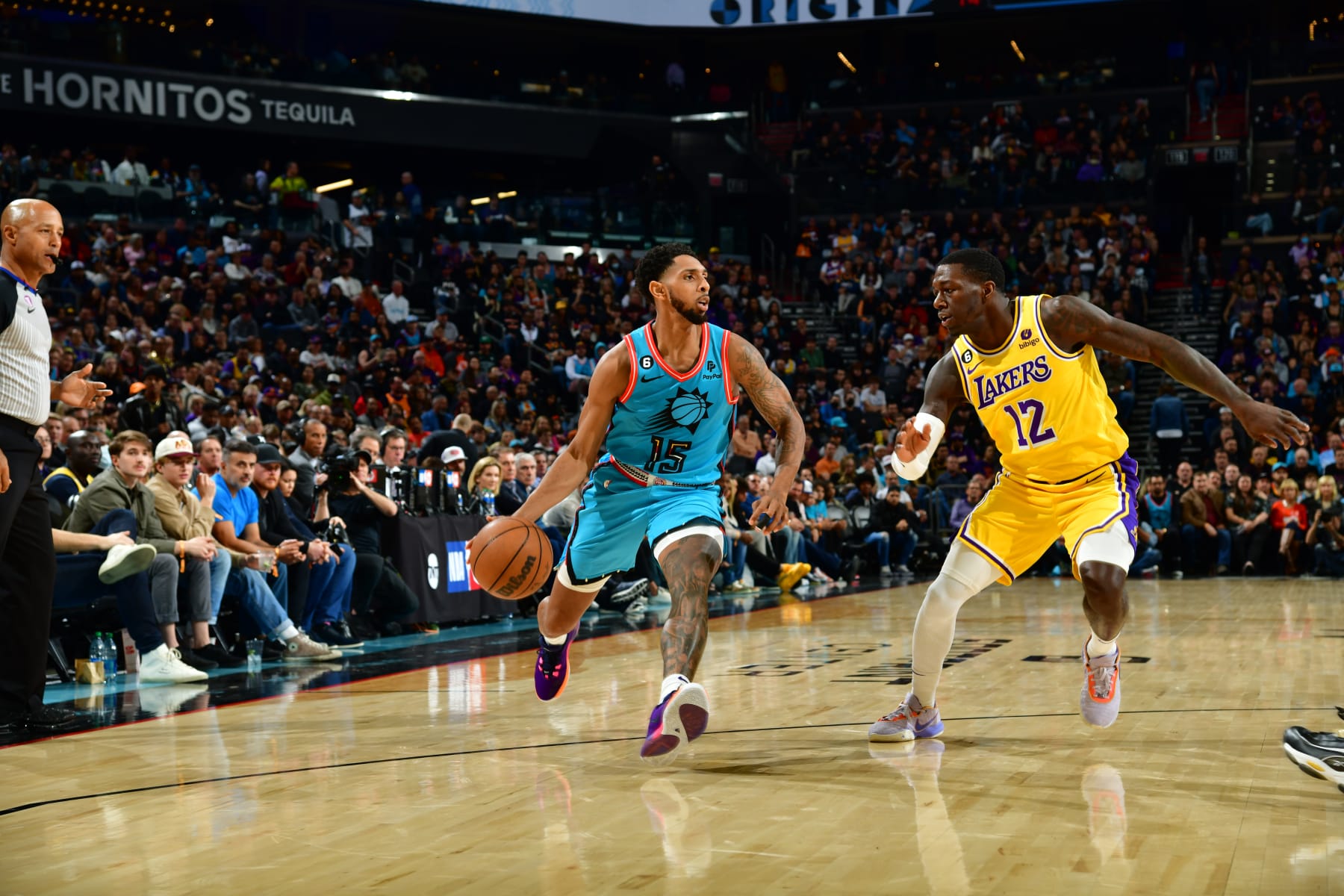 PHOENIX, AZ - NOVEMBER 22: Cameron Payne #15 of the Phoenix Suns handles the ball during the game against the Los Angeles Lakers on November 22, 2022 at Footprint Center in Phoenix, Arizona. NOTE TO USER: User expressly acknowledges and agrees that, by downloading and or using this photograph, user is consenting to the terms and conditions of the Getty Images License Agreement. Mandatory Copyright Notice: Copyright 2022 NBAE (Photo by Kate Frese/NBAE via Getty Images)