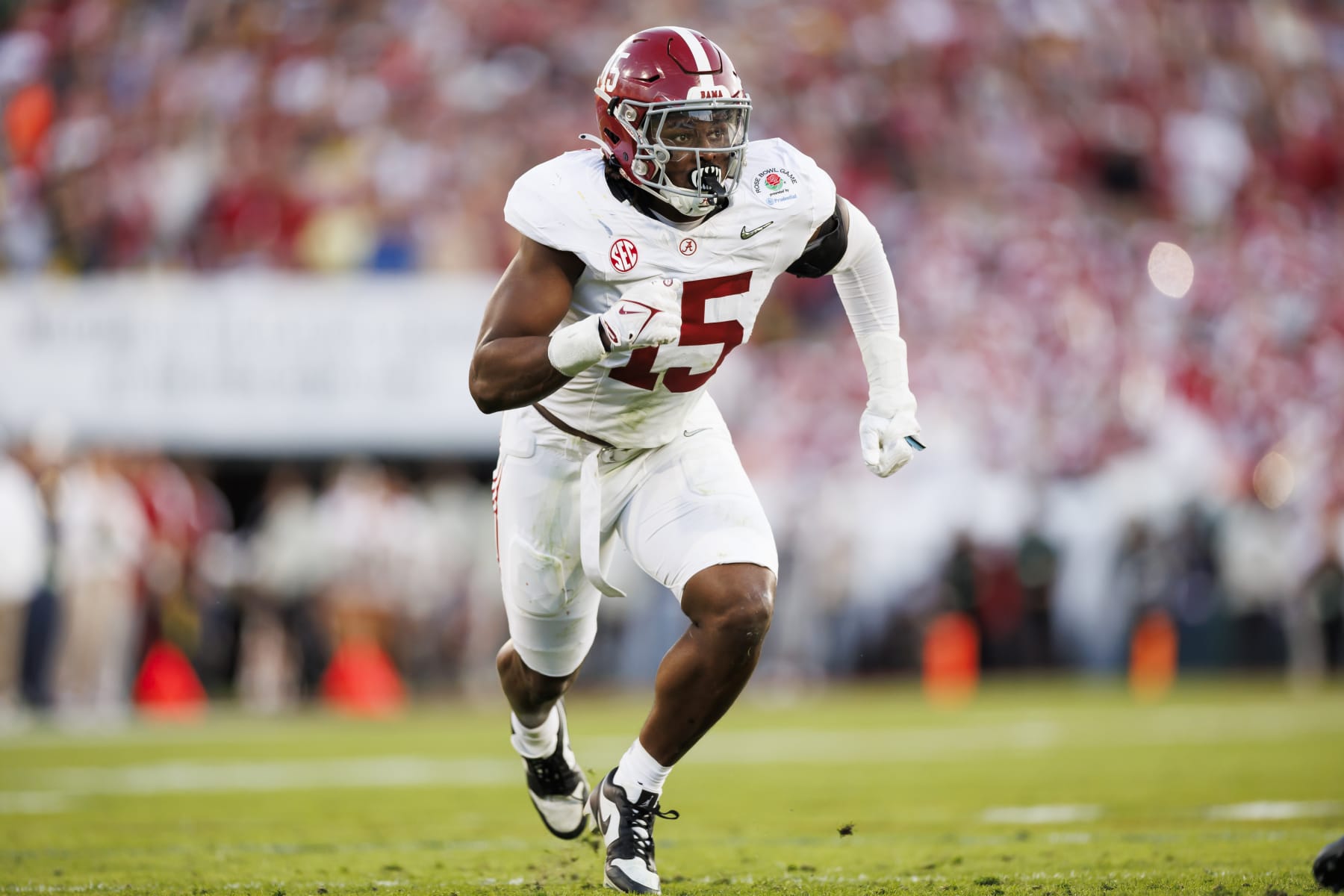 PASADENA, CALIFORNIA - JANUARY 01: Linebacker Dallas Turner #15 of the Alabama Crimson Tide runs around the edge during the CFP Semifinal Rose Bowl Game against the Michigan Wolverines at Rose Bowl Stadium on January 1, 2024 in Pasadena, California. (Photo by Ryan Kang/Getty Images)