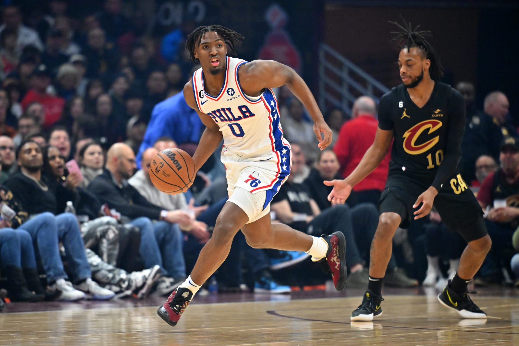 CLEVELAND, OHIO - MARCH 15: Tyrese Maxey #0 of the Philadelphia 76ers brings the ball up court during the first half against the Cleveland Cavaliers at Rocket Mortgage Fieldhouse on March 15, 2023 in Cleveland, Ohio. NOTE TO USER: User expressly acknowledges and agrees that, by downloading and or using this photograph, User is consenting to the terms and conditions of the Getty Images License Agreement. (Photo by Jason Miller/Getty Images)