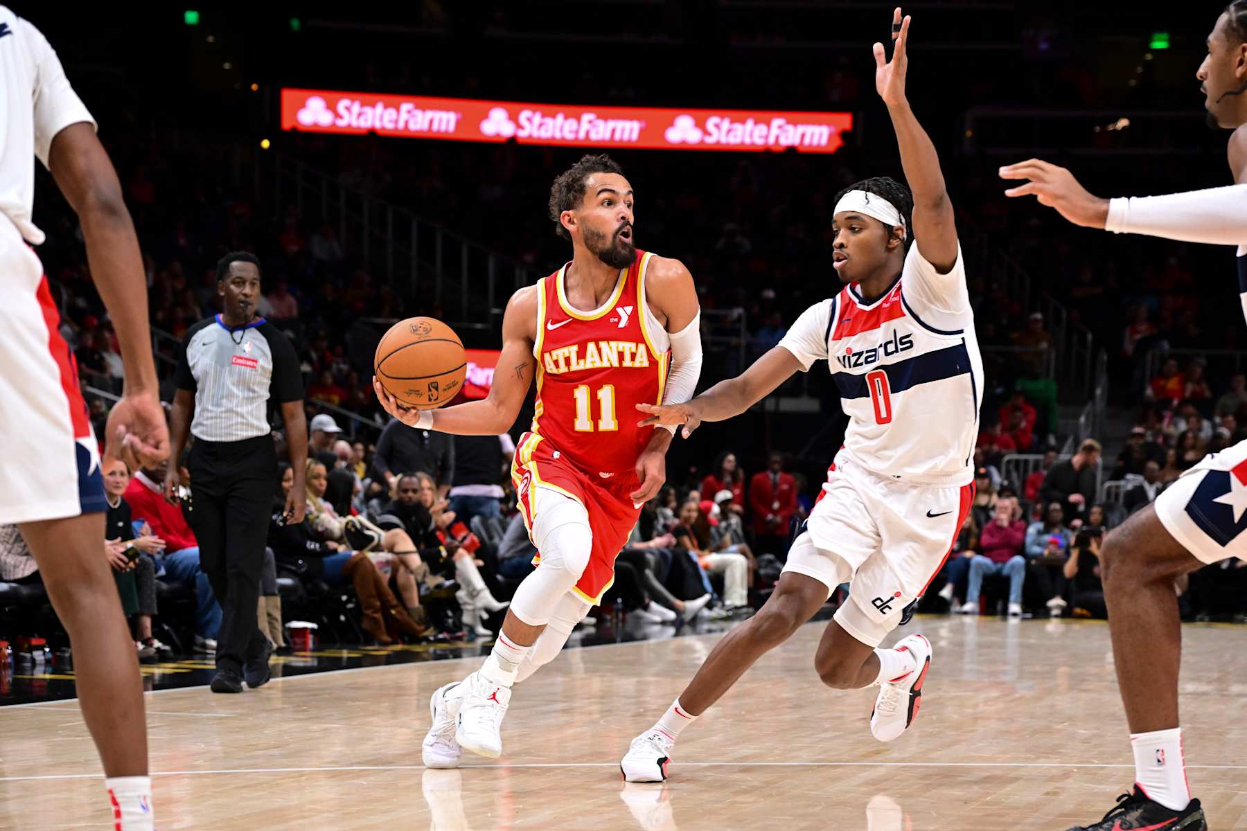 ATLANTA, GA - OCTOBER 28:  Trae Young #11 of the Atlanta Hawks drives to the basket during the game on October 28, 2024 at State Farm Arena in Atlanta, Georgia.  NOTE TO USER: User expressly acknowledges and agrees that, by downloading and/or using this Photograph, user is consenting to the terms and conditions of the Getty Images License Agreement. Mandatory Copyright Notice: Copyright 2024 NBAE (Photo by Adam Hagy/NBAE via Getty Images)