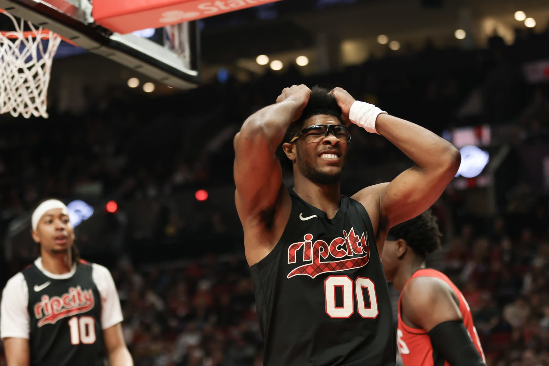 PORTLAND, OREGON - APRIL 12: Scoot Henderson #00 of the Portland Trail Blazers reacts to a call during the third quarter against the Houston Rockets at Moda Center on April 12, 2024 in Portland, Oregon. NOTE TO USER: User expressly acknowledges and agrees that, by downloading and or using this photograph, User is consenting to the terms and conditions of the Getty Images License Agreement.  (Photo by Amanda Loman/Getty Images)