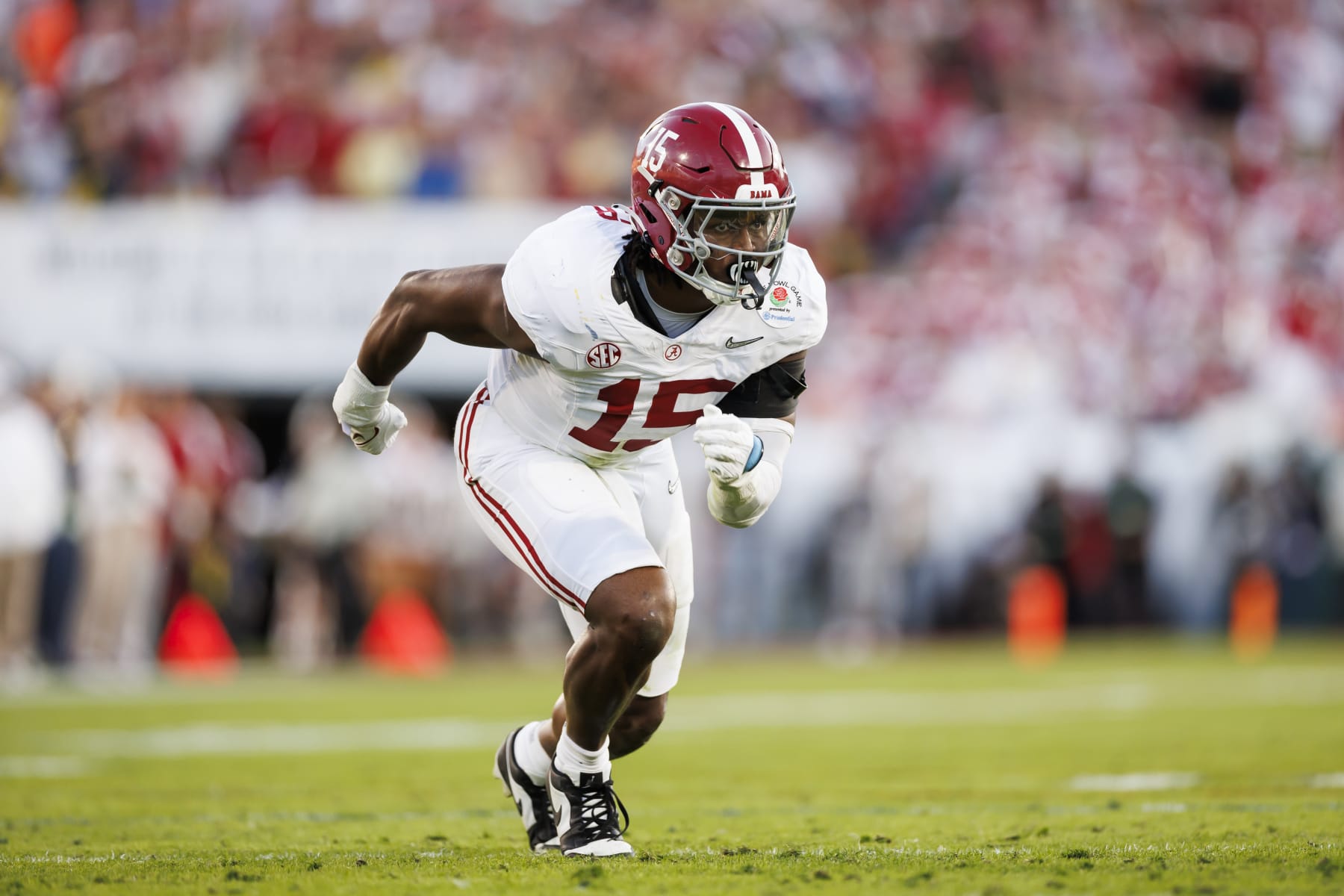PASADENA, CALIFORNIA - JANUARY 01: Linebacker Dallas Turner #15 of the Alabama Crimson Tide runs around the edge during the CFP Semifinal Rose Bowl Game against the Michigan Wolverines at Rose Bowl Stadium on January 1, 2024 in Pasadena, California. (Photo by Ryan Kang/Getty Images)