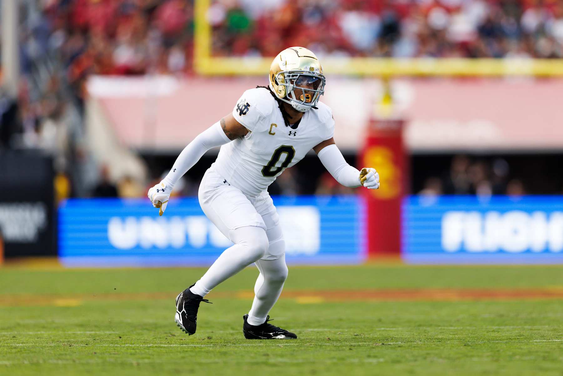 LOS ANGELES, CALIFORNIA - NOVEMBER 30: Xavier Watts #0 of the Notre Dame Fighting Irish defends in coverage during the first half against USC Trojans at United Airlines Field at the Los Angeles Memorial Coliseum on November 30, 2024 in Los Angeles, California. (Photo by Ric Tapia/Getty Images)