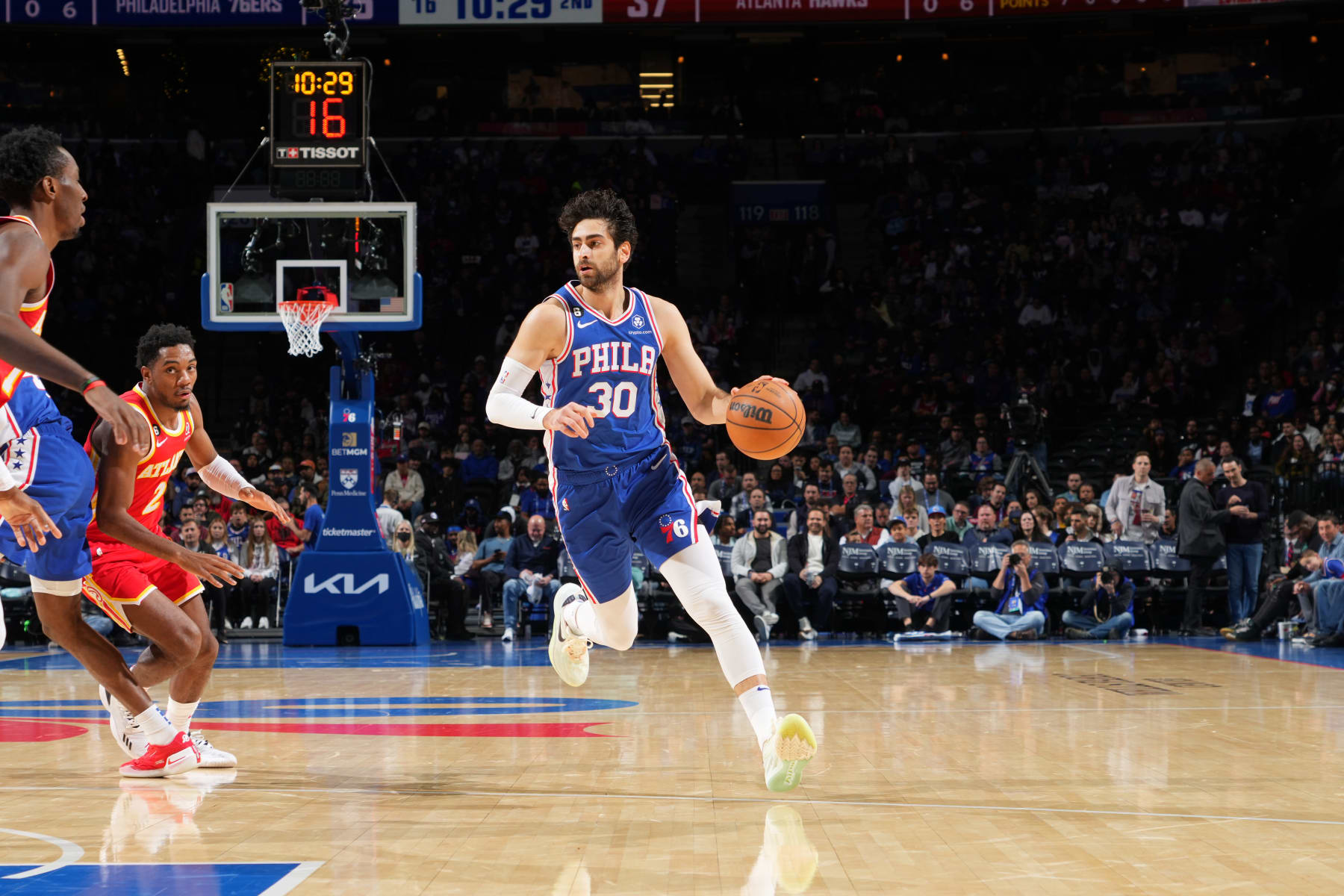 PHILADELPHIA, PA - NOVEMBER 28: Furkan Korkmaz #30 of the Philadelphia 76ers dribbles the ball during the game against the Atlanta Hawks on November 28, 2022 at the Wells Fargo Center in Philadelphia, Pennsylvania NOTE TO USER: User expressly acknowledges and agrees that, by downloading and/or using this Photograph, user is consenting to the terms and conditions of the Getty Images License Agreement. Mandatory Copyright Notice: Copyright 2022 NBAE (Photo by Jesse D. Garrabrant/NBAE via Getty Images)