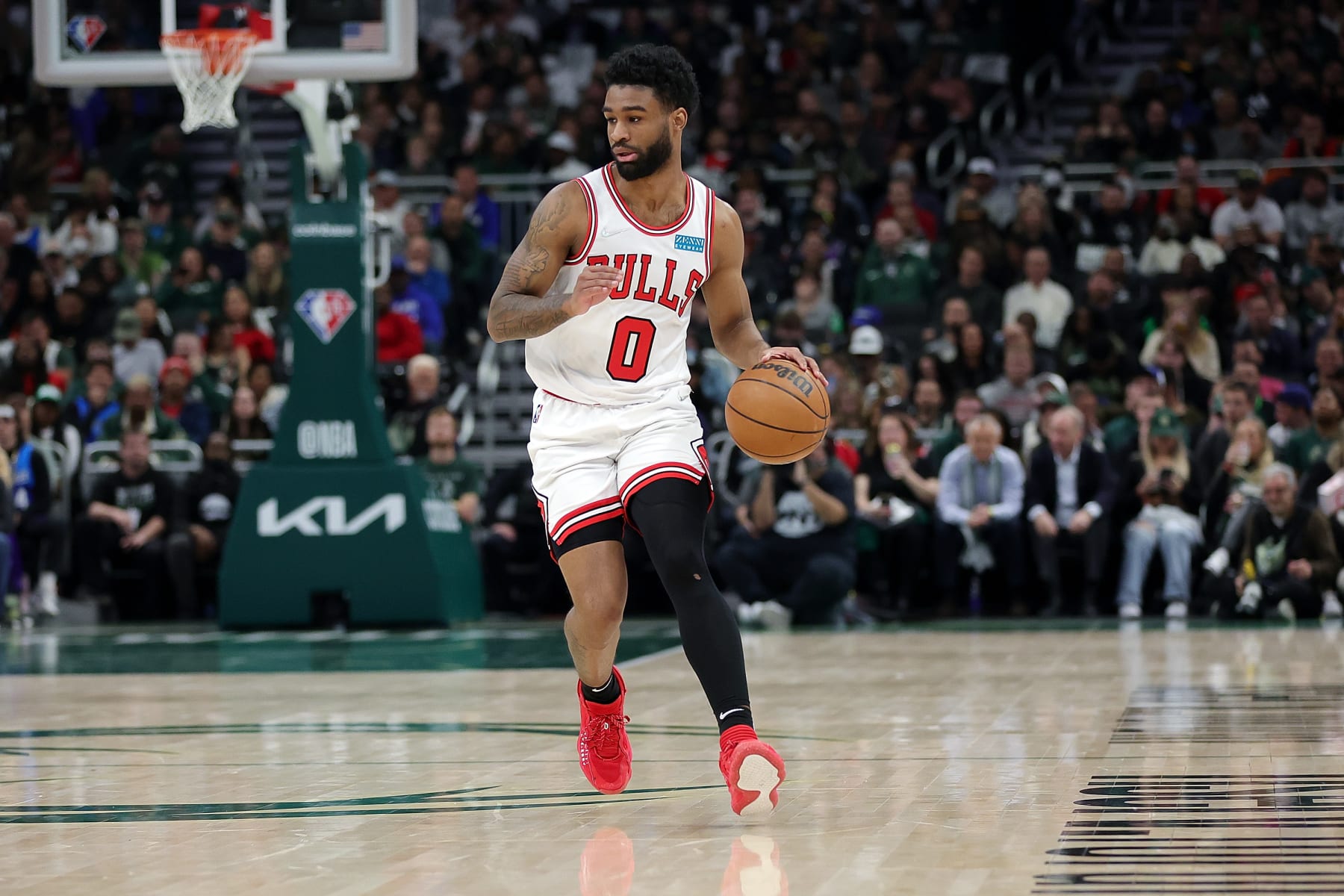 MILWAUKEE, WISCONSIN - APRIL 27: Coby White #0 of the Chicago Bulls handles the ball during Game Five of the Eastern Conference First Round Playoffs against the Milwaukee Bucks at Fiserv Forum on April 27, 2022 in Milwaukee, Wisconsin. NOTE TO USER: User expressly acknowledges and agrees that, by downloading and or using this photograph, User is consenting to the terms and conditions of the Getty Images License Agreement. (Photo by Stacy Revere/Getty Images)