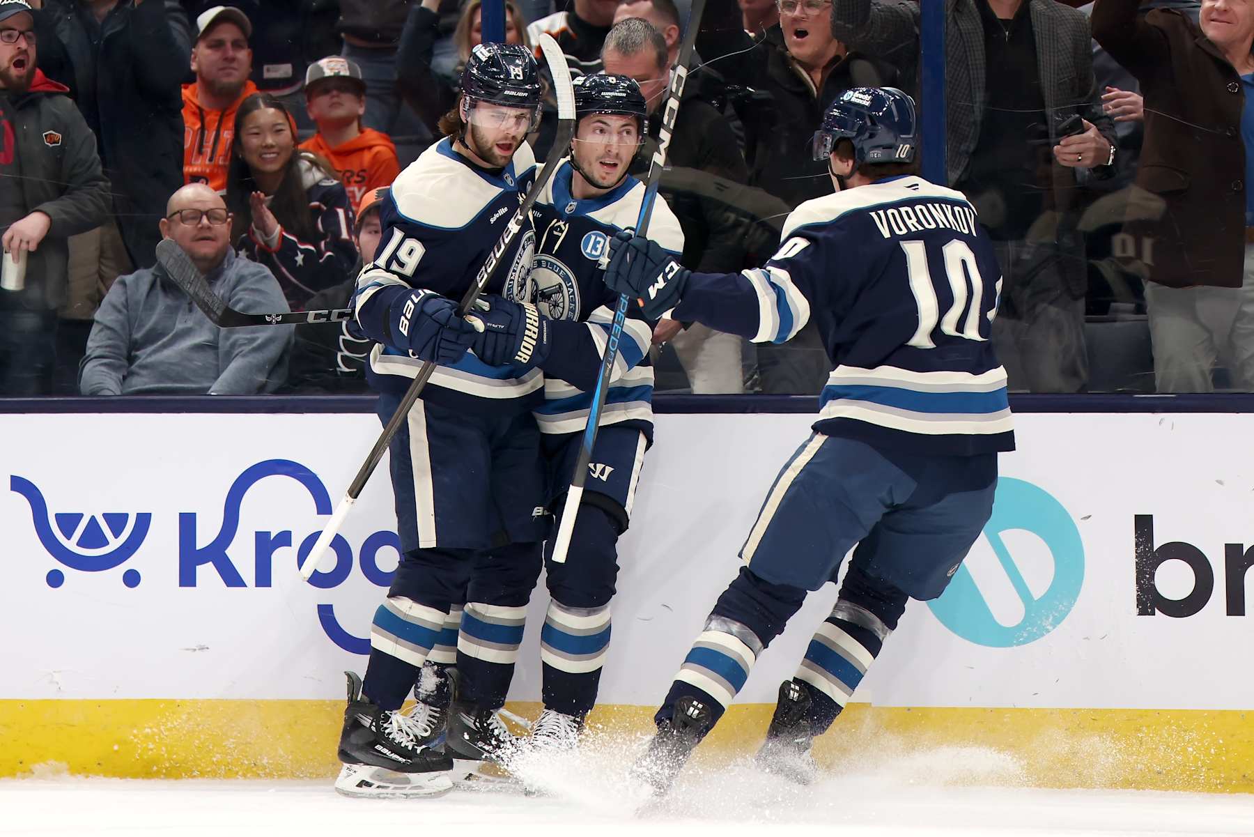 Zach Werenski, Adam Fantilli and Dmitri Voronkov.