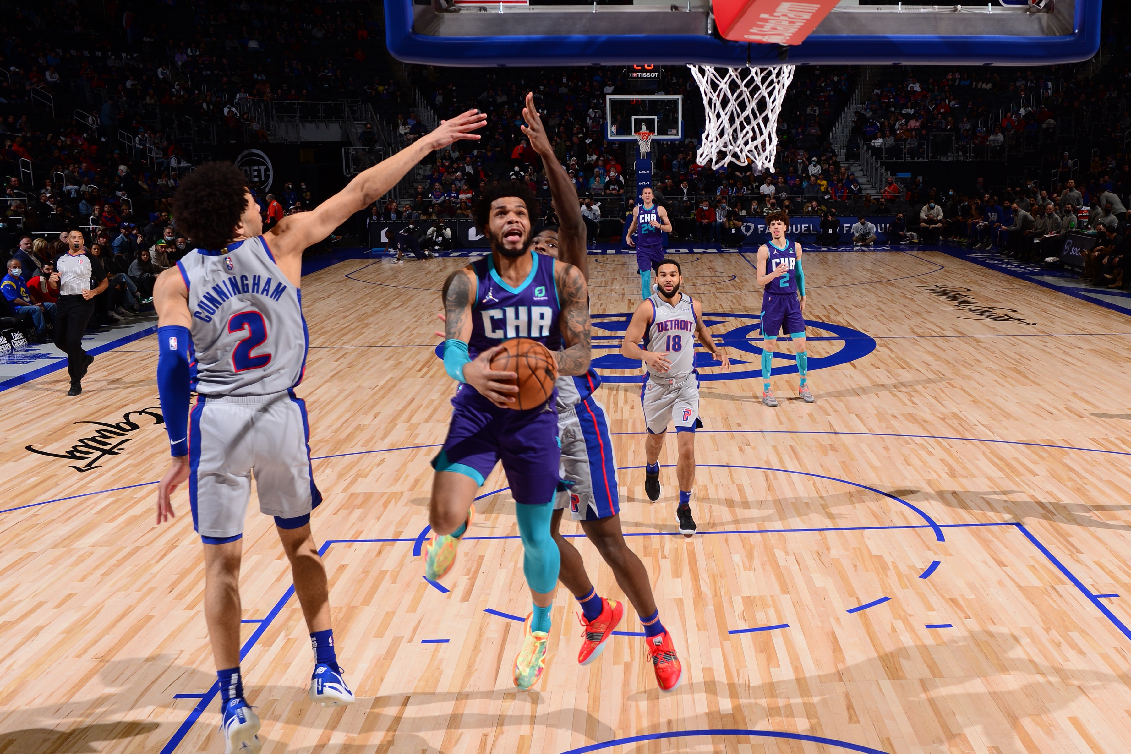 DETROIT, MI - FEBRUARY 11: Miles Bridges #0 of the Charlotte Hornets drives to the basket during the game during the game against the Detroit Pistons on February 11, 2022 at Little Caesars Arena in Detroit, Michigan. NOTE TO USER: User expressly acknowledges and agrees that, by downloading and/or using this photograph, User is consenting to the terms and conditions of the Getty Images License Agreement. Mandatory Copyright Notice: Copyright 2022 NBAE (Photo by Chris Schwegler/NBAE via Getty Images)