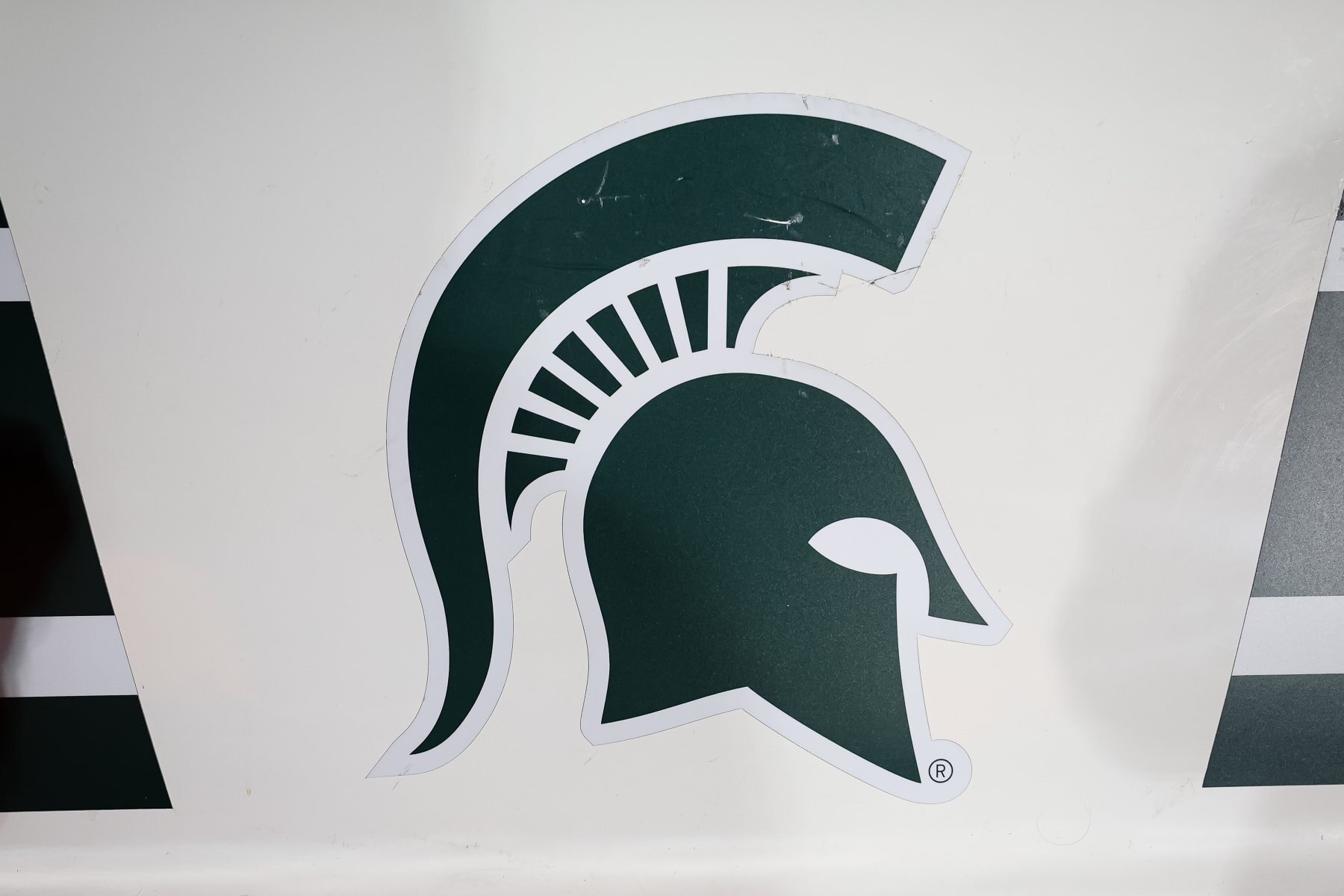 STATE COLLEGE, PA - NOVEMBER 26: A general view of the Michigan State logo on the players bench after the game between the Penn State Nittany Lions and the Michigan State Spartans at Beaver Stadium on November 26, 2022 in State College, Pennsylvania. (Photo by Scott Taetsch/Getty Images)