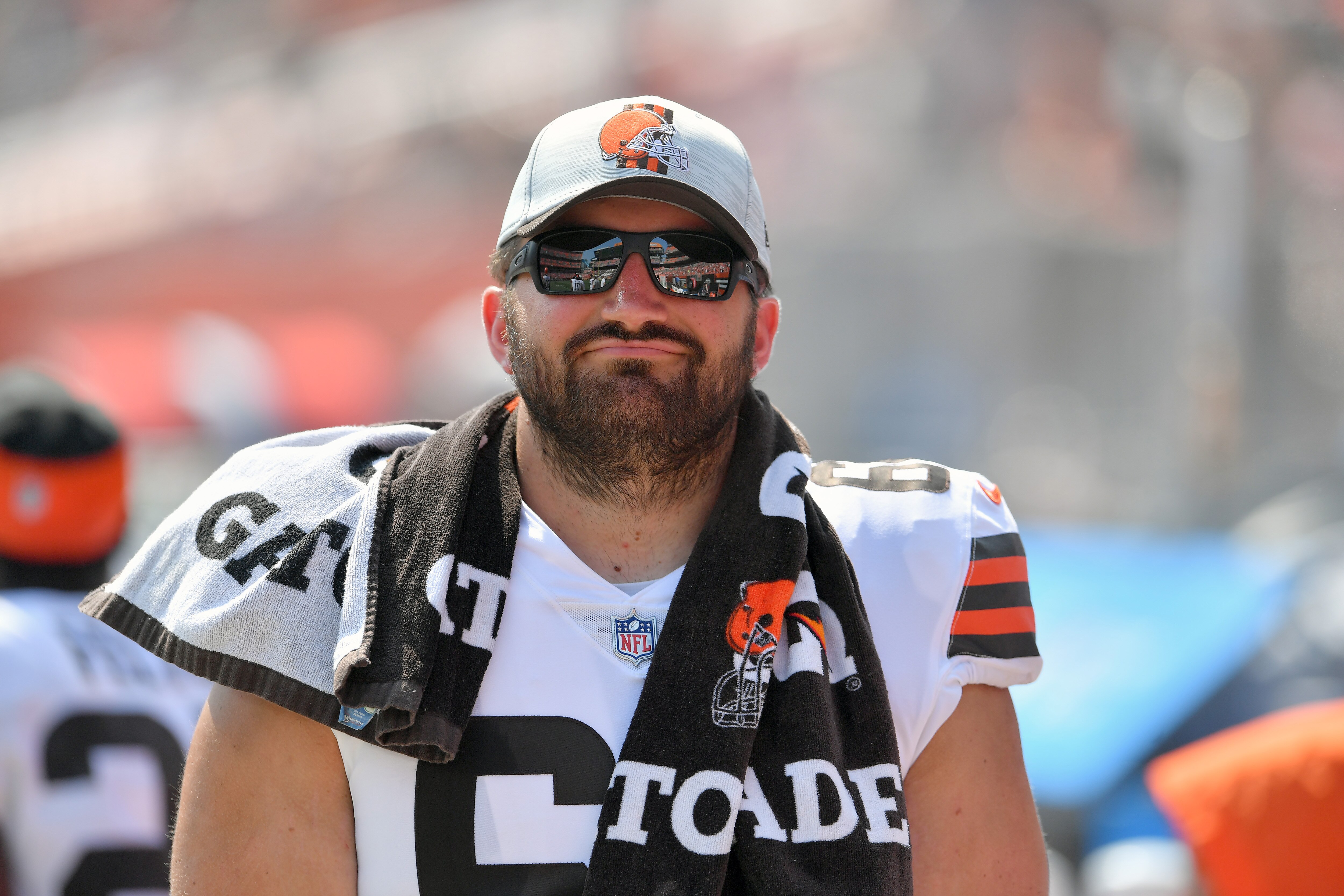 CLEVELAND, OHIO - AUGUST 22: Center JC Tretter #64 of the Cleveland Browns watches from the sidelines during the second half against the New York Giants at FirstEnergy Stadium on August 22, 2021 in Cleveland, Ohio. The Browns defeated the Giants 17-13.  (Photo by Jason Miller/Getty Images)