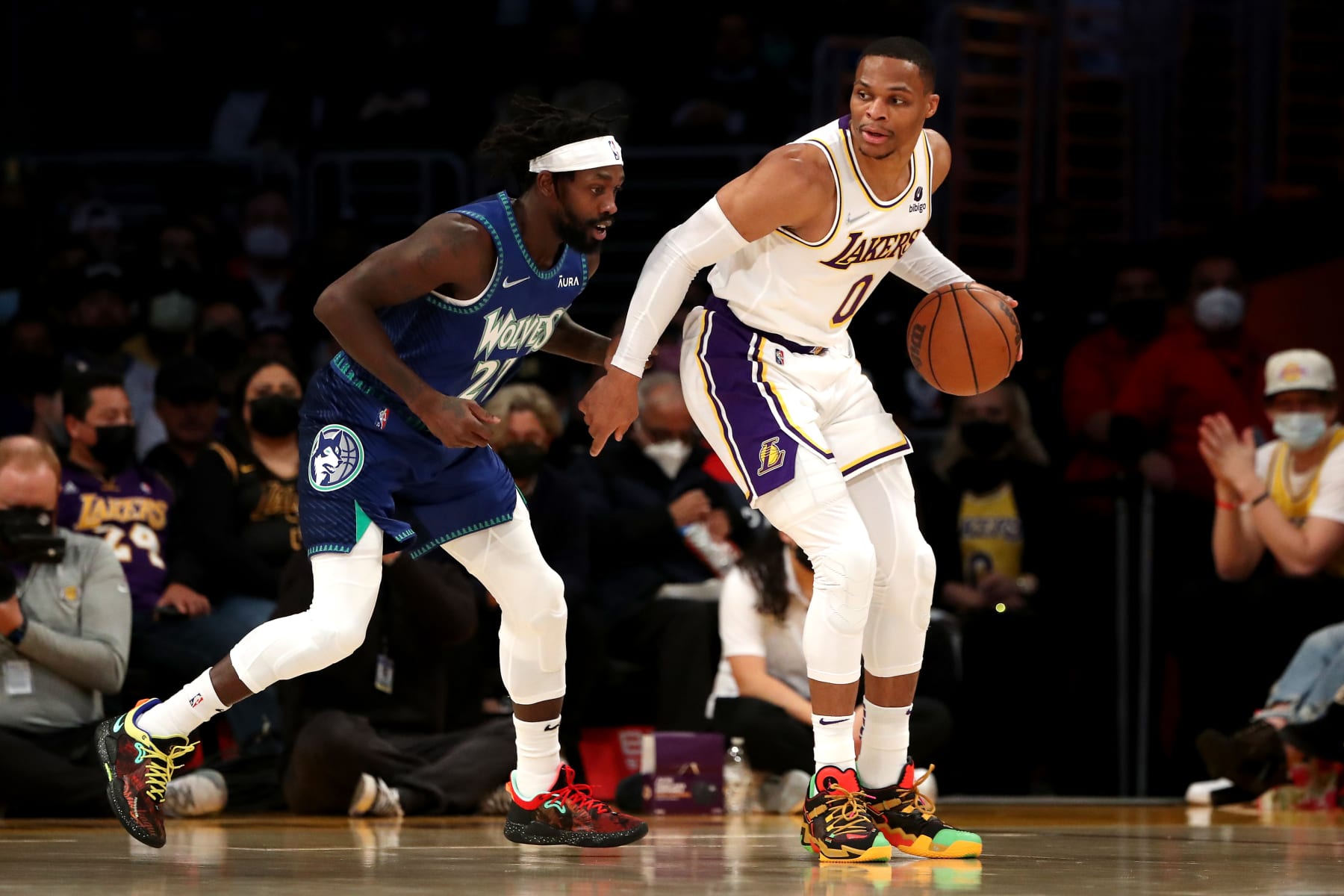 LOS ANGELES, CALIFORNIA - JANUARY 02: Russell Westbrook #0 of the Los Angeles Lakers handles the ball against Patrick Beverley #22 of the Minnesota Timberwolves during the first quarter at Crypto.com Arena on January 02, 2022 in Los Angeles, California. NOTE TO USER: User expressly acknowledges and agrees that, by downloading and or using this photograph, User is consenting to the terms and conditions of the Getty Images License Agreement. (Photo by Katelyn Mulcahy/Getty Images)