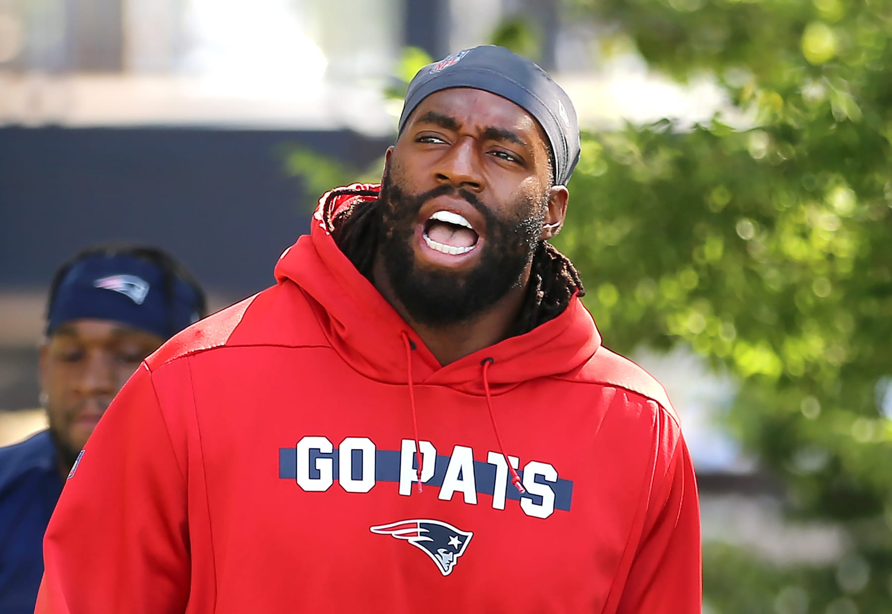 Foxborough, MA - July 28: New England Patriots LB Matthew Judon talks to fans as he arrives at training camp. (Photo by John Tlumacki/The Boston Globe via Getty Images)