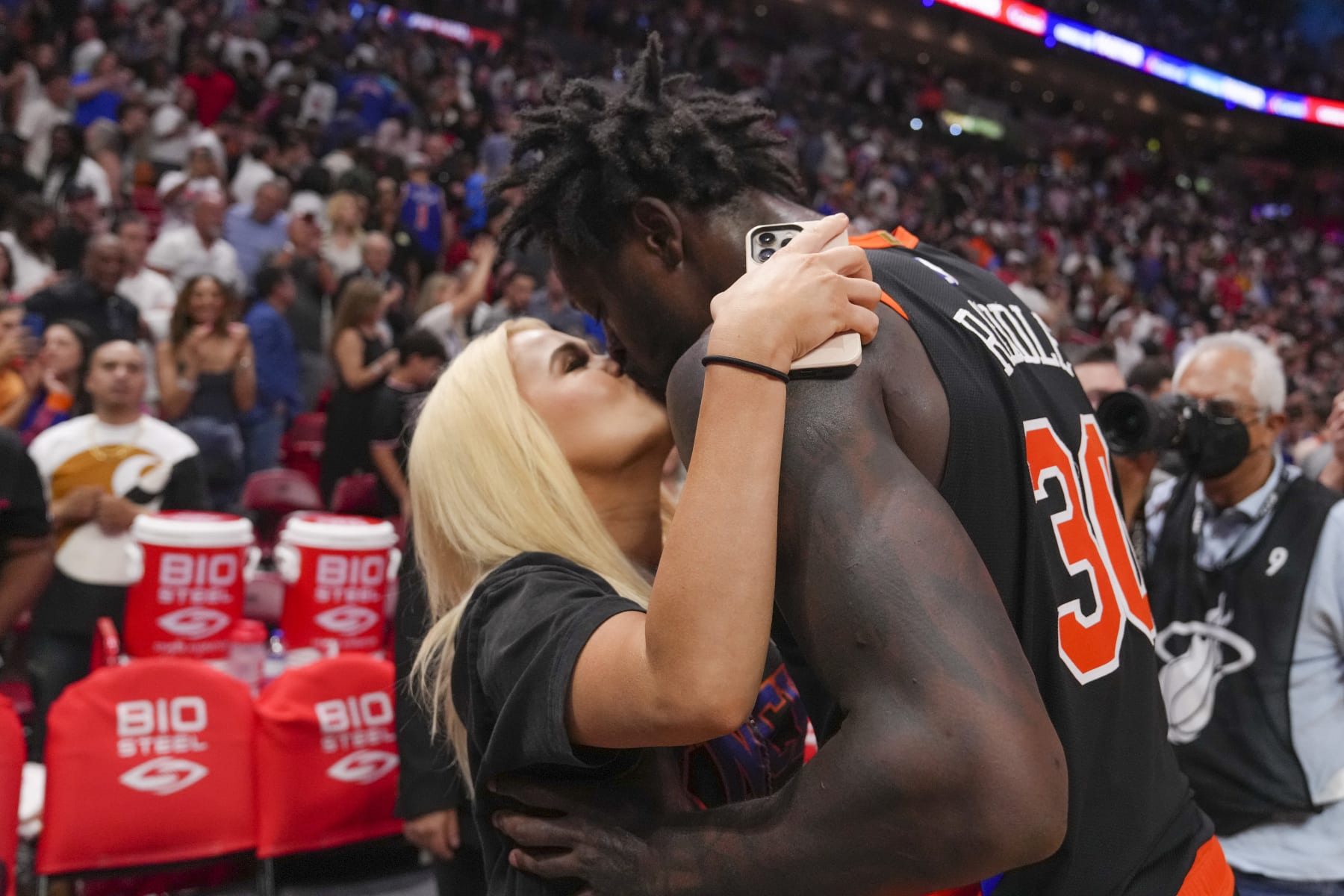MIAMI, FLORIDA - MARCH 03: Julius Randle #30 of the New York Knicks gives his wife, Kendra Randle, a kiss after his team defeated the Miami Heat at Miami-Dade Arena on March 03, 2023 in Miami, Florida. NOTE TO USER: User expressly acknowledges and agrees that,  by downloading and or using this photograph,  User is consenting to the terms and conditions of the Getty Images License Agreement. (Photo by Eric Espada/Getty Images)