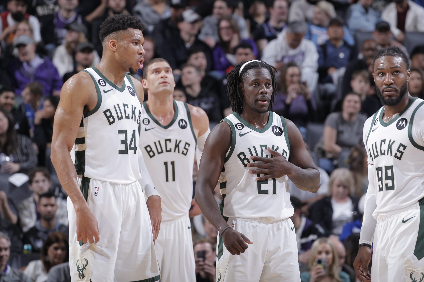 SACRAMENTO, CA - MARCH 13: Giannis Antetokounmpo #34, Brook Lopez #11, Jrue Holiday #21, and Jae Crowder #99 of the Milwaukee Bucks look on during the game against the Sacramento Kings on March 13, 2023 at Golden 1 Center in Sacramento, California. NOTE TO USER: User expressly acknowledges and agrees that, by downloading and or using this photograph, User is consenting to the terms and conditions of the Getty Images Agreement. Mandatory Copyright Notice: Copyright 2023 NBAE (Photo by Rocky Widner/NBAE via Getty Images)