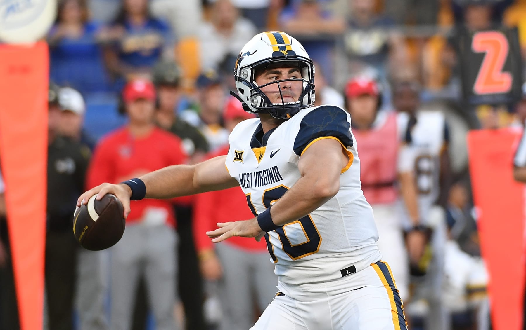 PITTSBURGH, PA - SEPTEMBER 01: JT Daniels #18 of the West Virginia Mountaineers drops back to pass in the first quarter during the game against the Pittsburgh Panthers at Acrisure Stadium on September 1, 2022 in Pittsburgh, Pennsylvania. (Photo by Justin Berl/Getty Images)