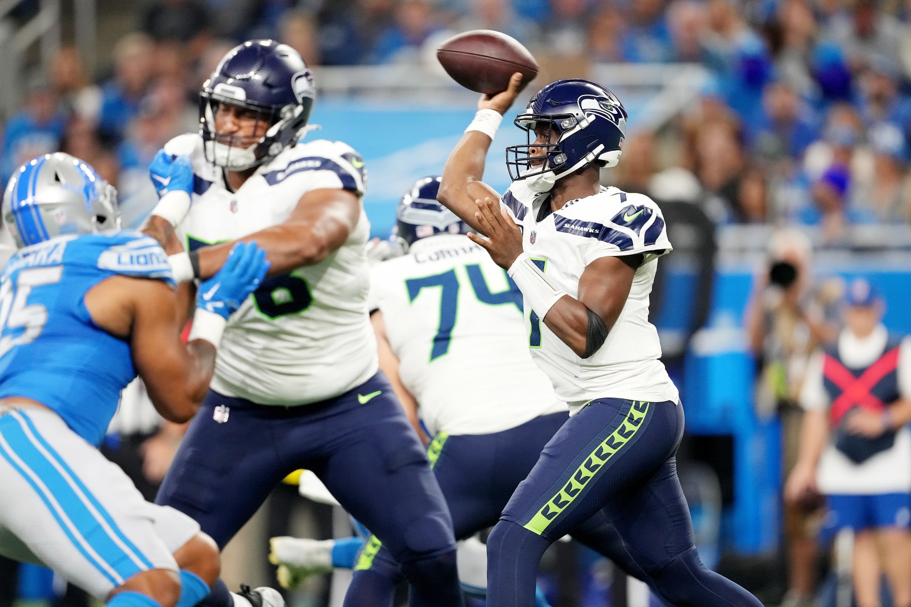 DETROIT, MICHIGAN - SEPTEMBER 17: Geno Smith #7 of the Seattle Seahawks throws a pass during the second quarter in the game against the Detroit Lions at Ford Field on September 17, 2023 in Detroit, Michigan. (Photo by Nic Antaya/Getty Images)