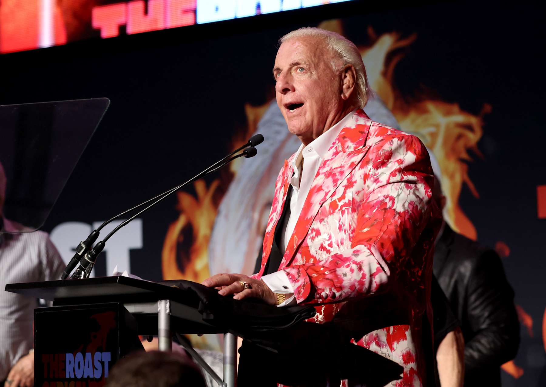 NASHVILLE, TENNESSEE - JULY 29: Ric Flair speaks onstage at The Roast of Ric Flair at Nashville Fairgrounds on July 29, 2022 in Nashville, Tennessee. (Photo by Jason Kempin/Getty Images)