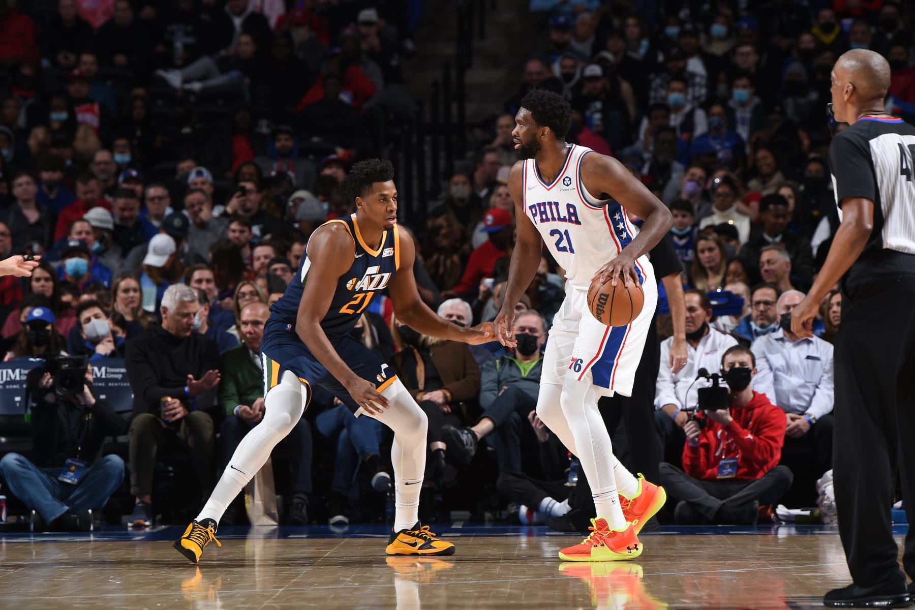 PHILADELPHIA, PA - DECEMBER 9: Joel Embiid #21 of the Philadelphia 76ers handles the ball against Hassan Whiteside #21 of the Utah Jazz on December 9, 2021 at Wells Fargo Center in Philadelphia, Pennsylvania. NOTE TO USER: User expressly acknowledges and agrees that, by downloading and/or using this Photograph, user is consenting to the terms and conditions of the Getty Images License Agreement. Mandatory Copyright Notice: Copyright 2021 NBAE (Photo by David Dow/NBAE via Getty Images)