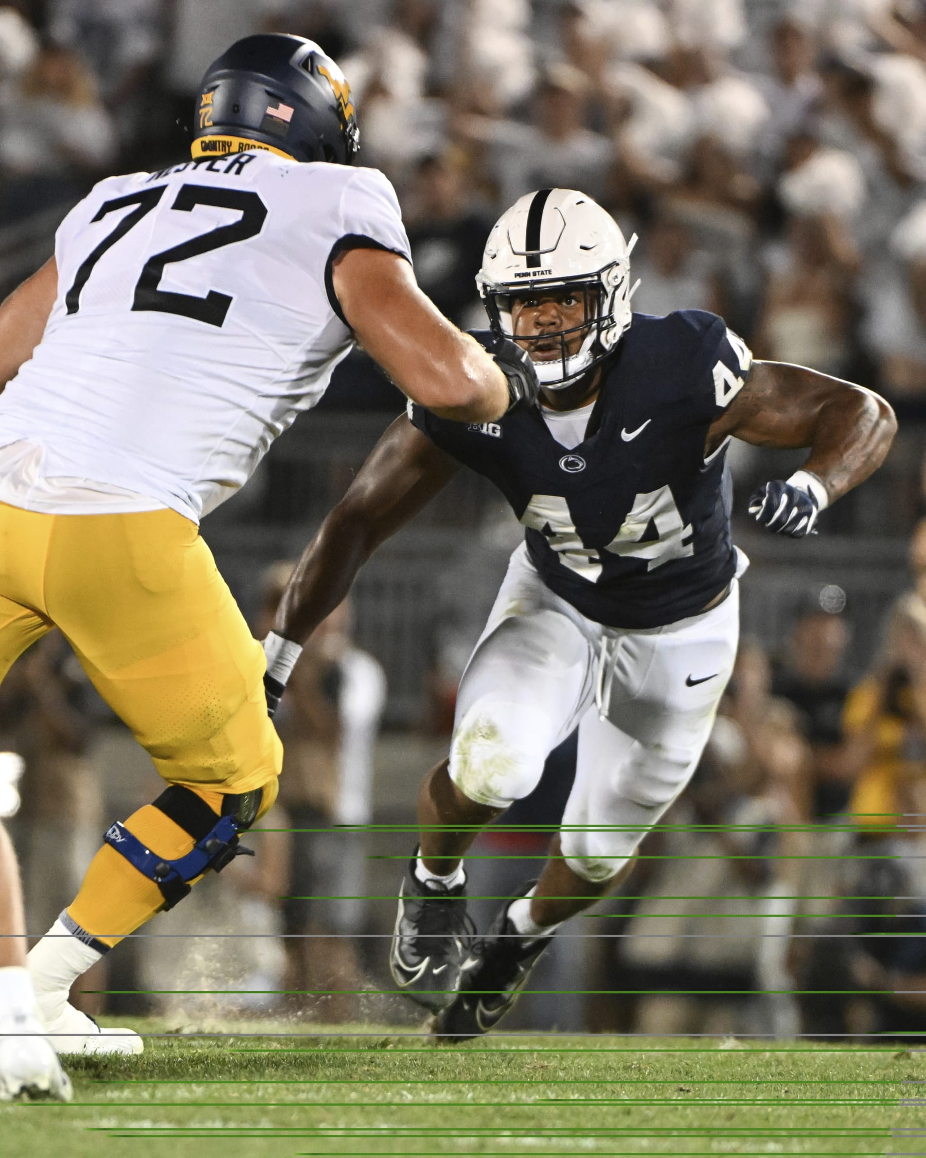 Penn State defensive end Chop Robinson (44) pass rushes against West Virginia offensive lineman Doug Nester (72) during an NCAA college football game, Saturday, Sept. 2, 2023, in State College, Pa. (AP Photo/Barry Reeger)