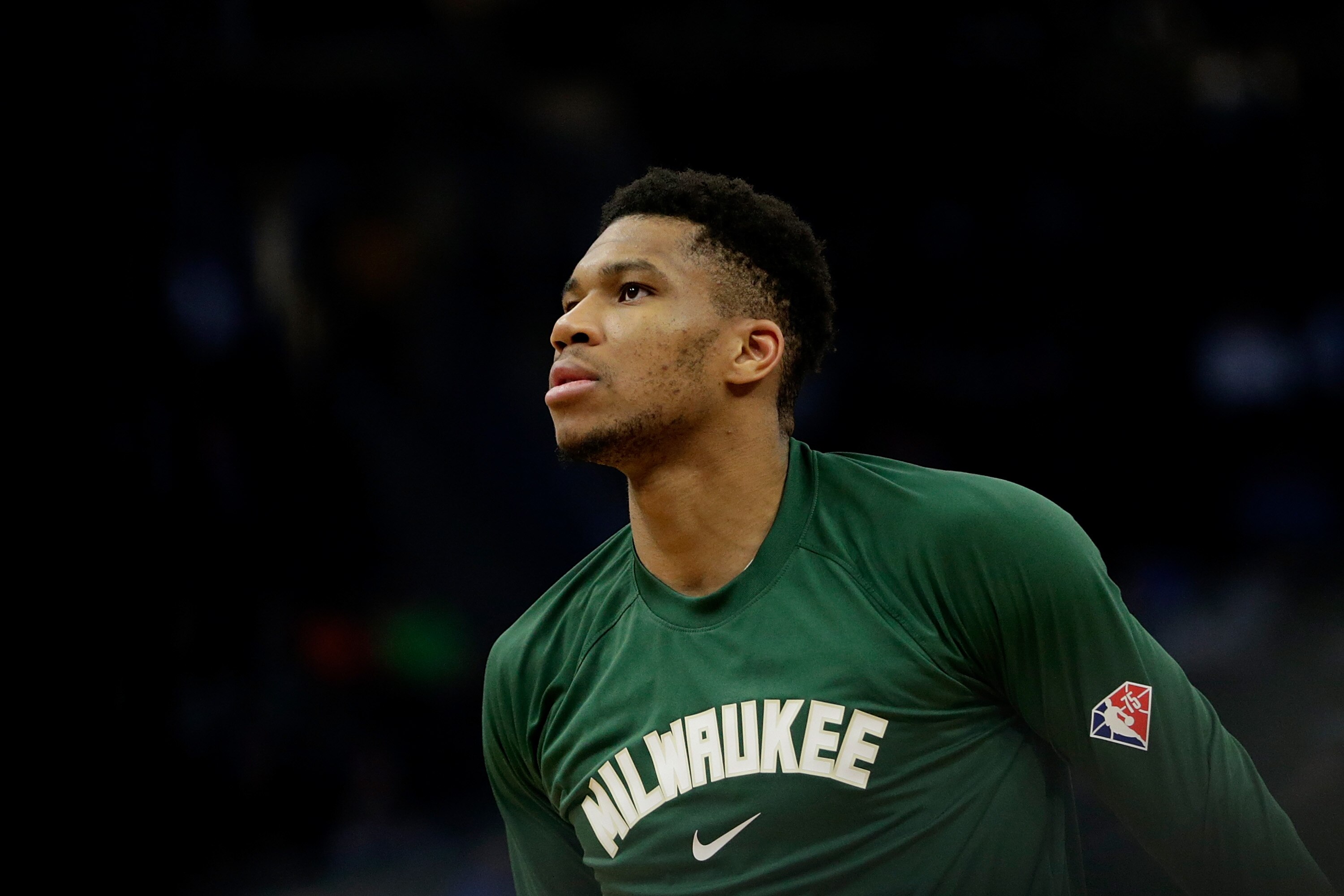MILWAUKEE, WISCONSIN - OCTOBER 31: Giannis Antetokounmpo #34 of the Milwaukee Bucks warms up before the start of the second half  at Fiserv Forum on October 31, 2021 in Milwaukee, Wisconsin. Jazz defeated the Bucks 107-95. NOTE TO USER: User expressly acknowledges and agrees that, by downloading and or using this photograph, User is consenting to the terms and conditions of the Getty Images License Agreement. (Photo by John Fisher/Getty Images)