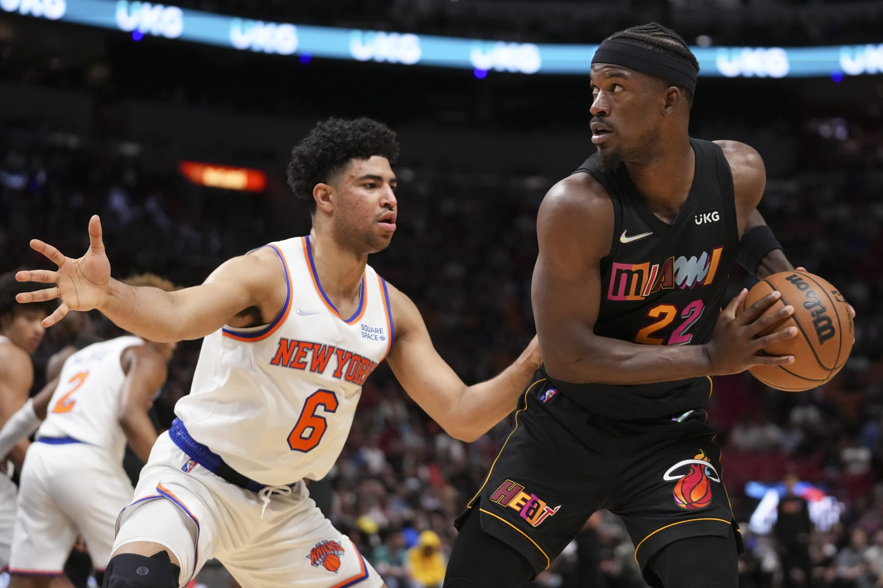 MIAMI, FLORIDA - MARCH 25: Jimmy Butler #22 of the Miami Heat posts up Quentin Grimes #6 of the New York Knicks during the second half at FTX Arena on March 25, 2022 in Miami, Florida.NOTE TO USER: User expressly acknowledges and agrees that,  by downloading and or using this photograph,  User is consenting to the terms and conditions of the Getty Images License Agreement. (Photo by Eric Espada/Getty Images)