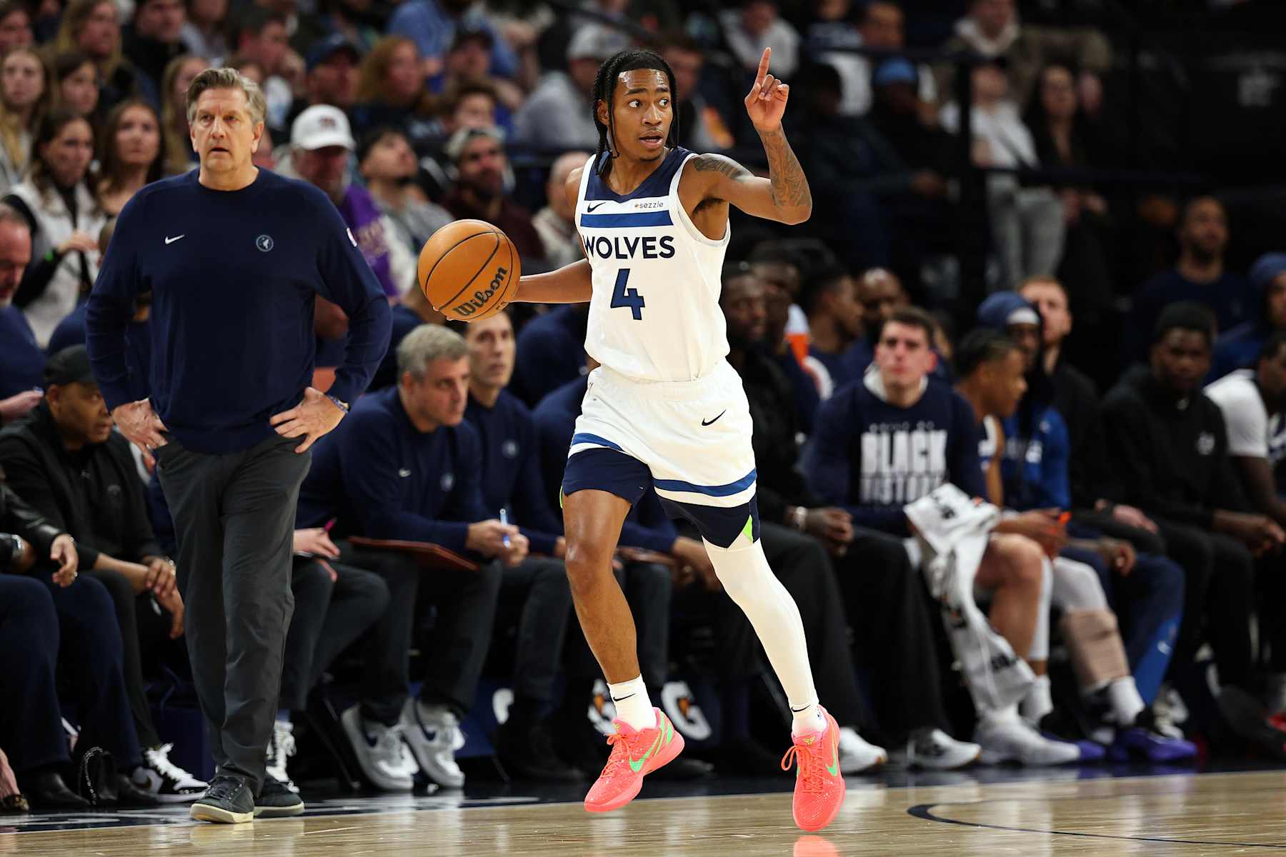 MINNEAPOLIS, MINNESOTA - FEBRUARY 08: Rob Dillingham #4 of the Minnesota Timberwolves calls a play against the Portland Trail Blazers in the second quarter at Target Center on February 08, 2025 in Minneapolis, Minnesota. NOTE TO USER: User expressly acknowledges and agrees that, by downloading and or using this photograph, User is consenting to the terms and conditions of the Getty Images License Agreement. (Photo by David Berding/Getty Images)