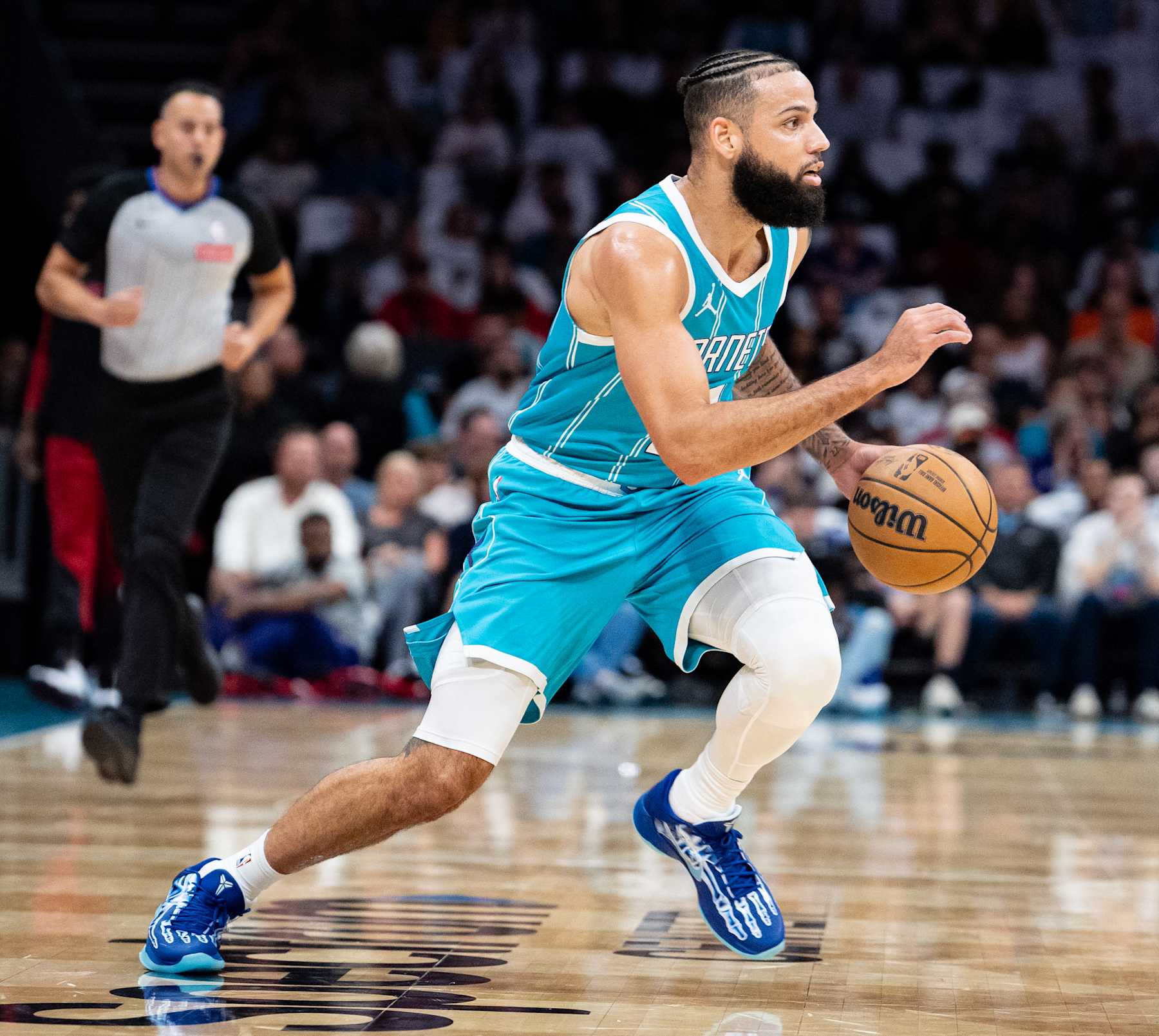 CHARLOTTE, NORTH CAROLINA - OCTOBER 26: Cody Martin #11 of the Charlotte Hornets plays against the Miami Heat during their game at Spectrum Center on October 26, 2024 in Charlotte, North Carolina. NOTE TO USER: User expressly acknowledges and agrees that, by downloading and or using this photograph, User is consenting to the terms and conditions of the Getty Images License Agreement. (Photo by Jacob Kupferman/Getty Images)