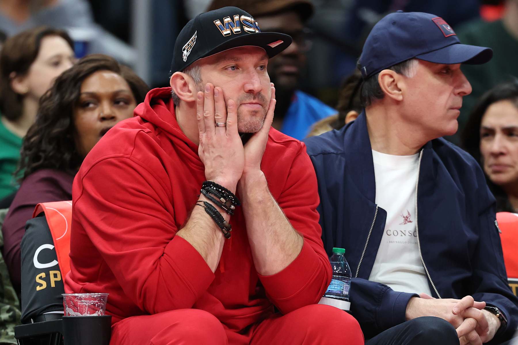 WASHINGTON, DC - NOVEMBER 22: Alex Ovechkin #8 of the Washington Capitals looks on as the Boston Celtics play against the Washington Wizards during the first half in the Emirates NBA Cup at Capital One Arena on November 22, 2024 in Washington, DC. NOTE TO USER: User expressly acknowledges and agrees that, by downloading and or using this photograph, User is consenting to the terms and conditions of the Getty Images License Agreement.  (Photo by Patrick Smith/Getty Images)