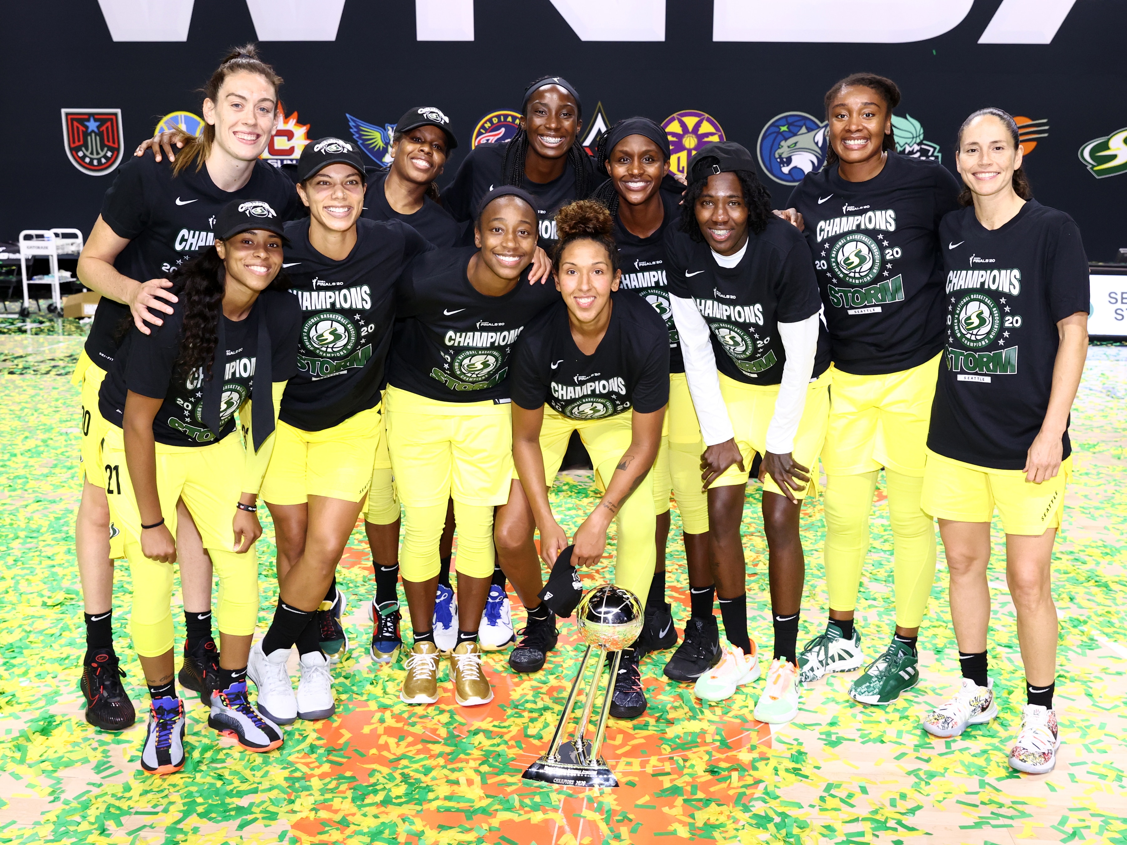 PALMETTO, FL - OCTOBER 6:  The Seattle Storm pose for a team photo with the trophy after winning the 2020 WNBA Championship in Game Three of the WNBA Finals against the Las Vegas Aces on October 6, 2020 at Feld Entertainment Center in Palmetto, Florida. NOTE TO USER: User expressly acknowledges and agrees that, by downloading and/or using this Photograph, user is consenting to the terms and conditions of the Getty Images License Agreement. Mandatory Copyright Notice: Copyright 2020 NBAE (Photo by Ned Dishman/NBAE via Getty Images)