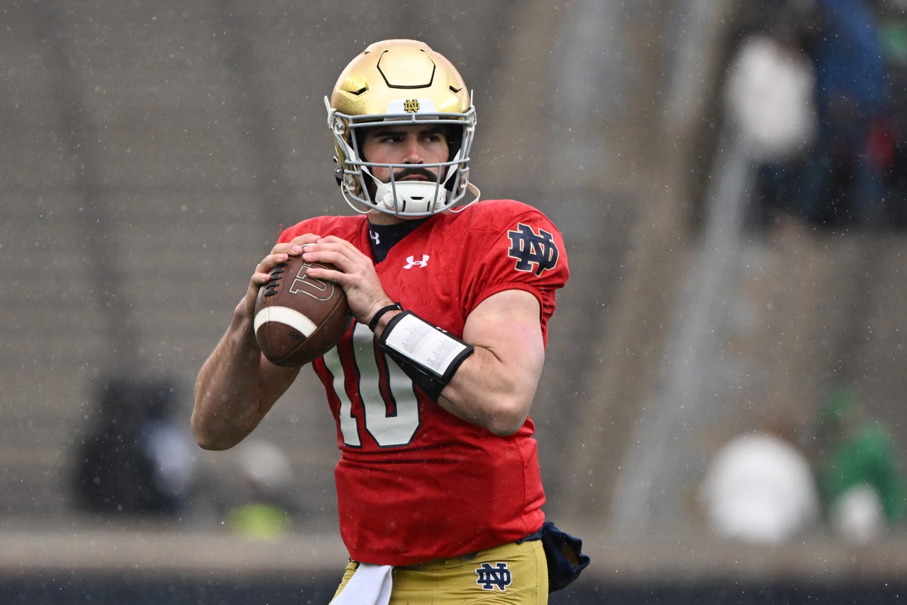 SOUTH BEND, INDIANA - APRIL 22: Sam Hartman #10 of the Notre Dame Fighting Irish warms up before the Notre Dame Blue-Gold Spring Football Game at Notre Dame Stadium on April 22, 2023 in South Bend, Indiana. (Photo by Quinn Harris/Getty Images)